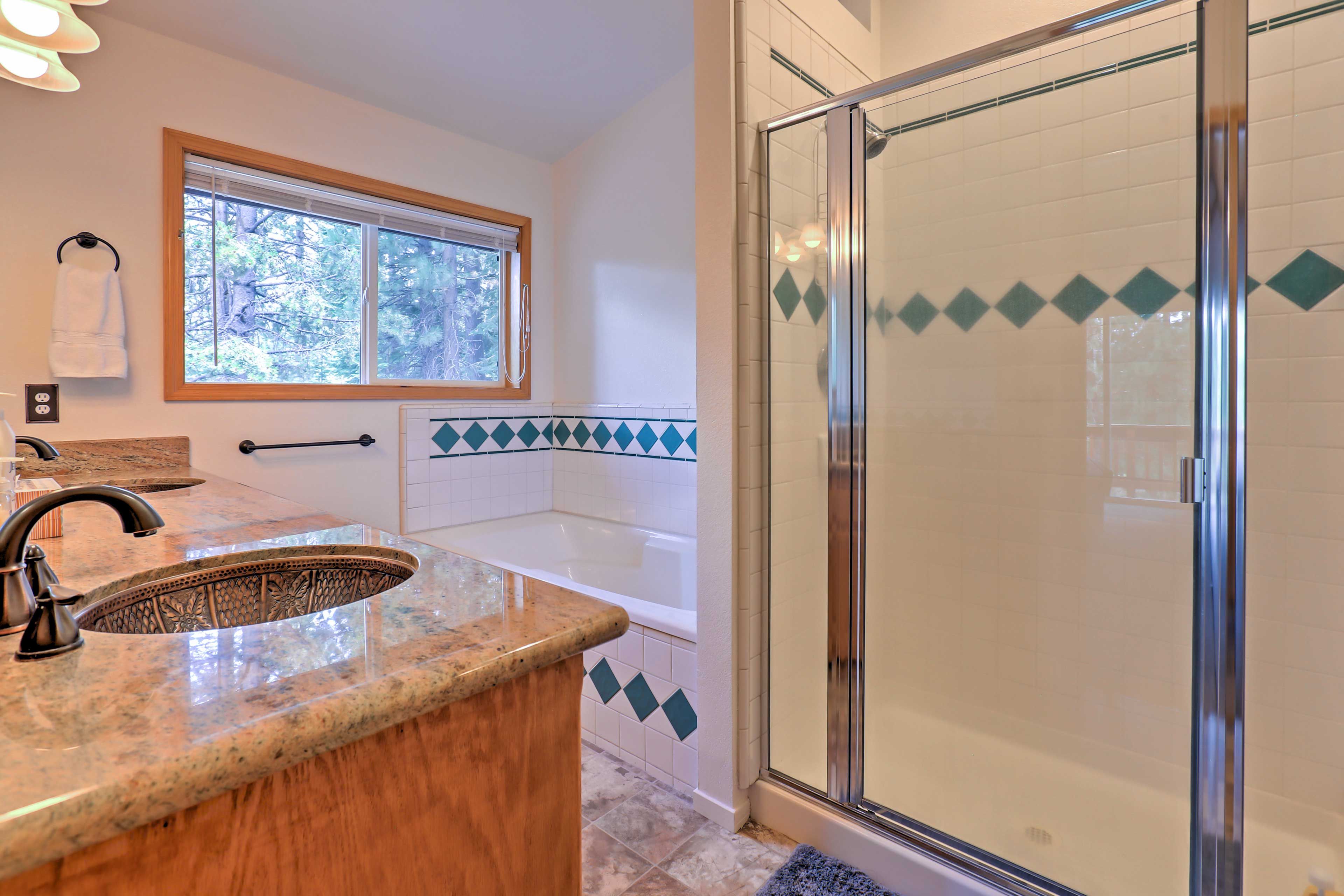 The pristine master bath boasts a walk-in shower.