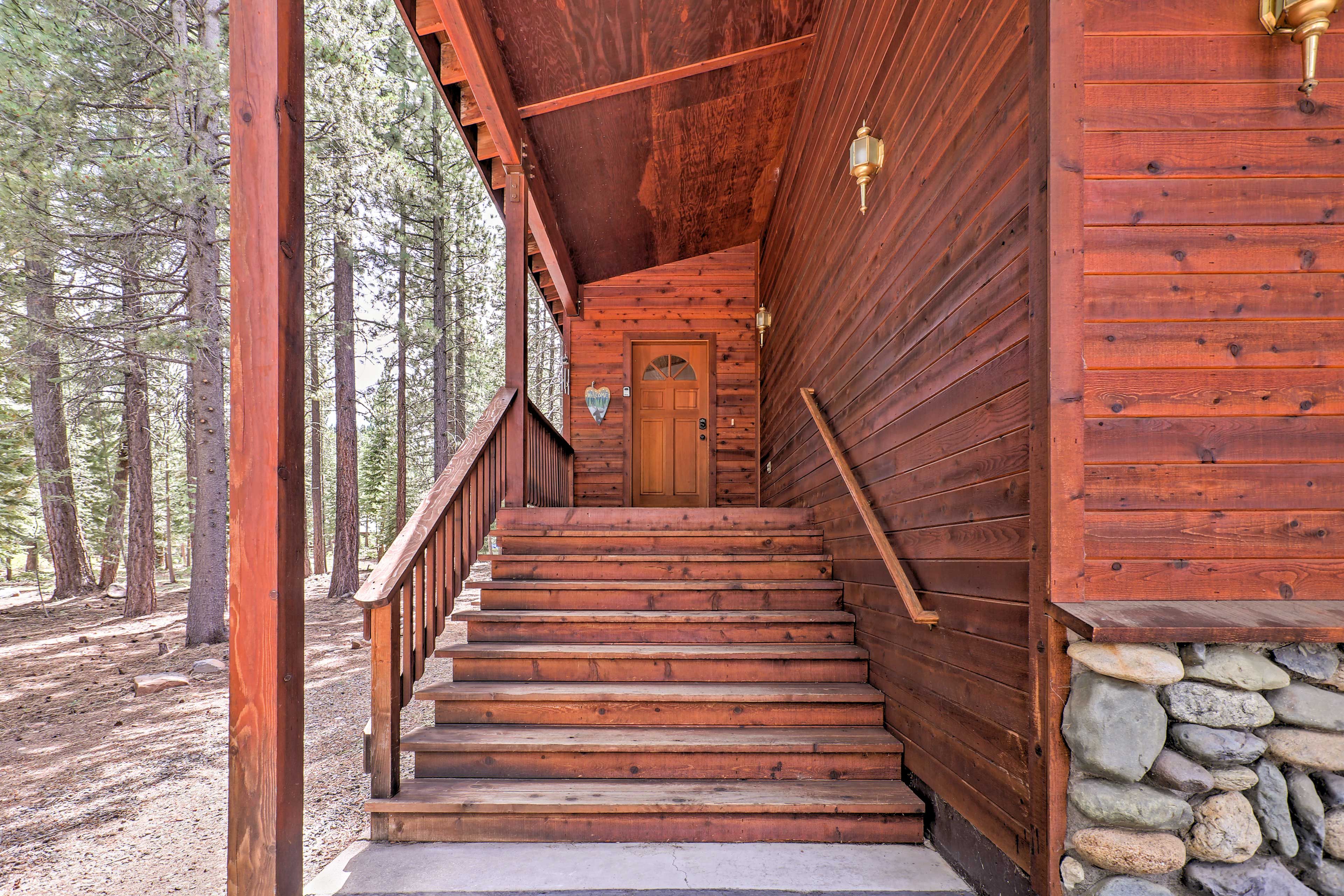 Relish in the home's beautiful red wood exterior.