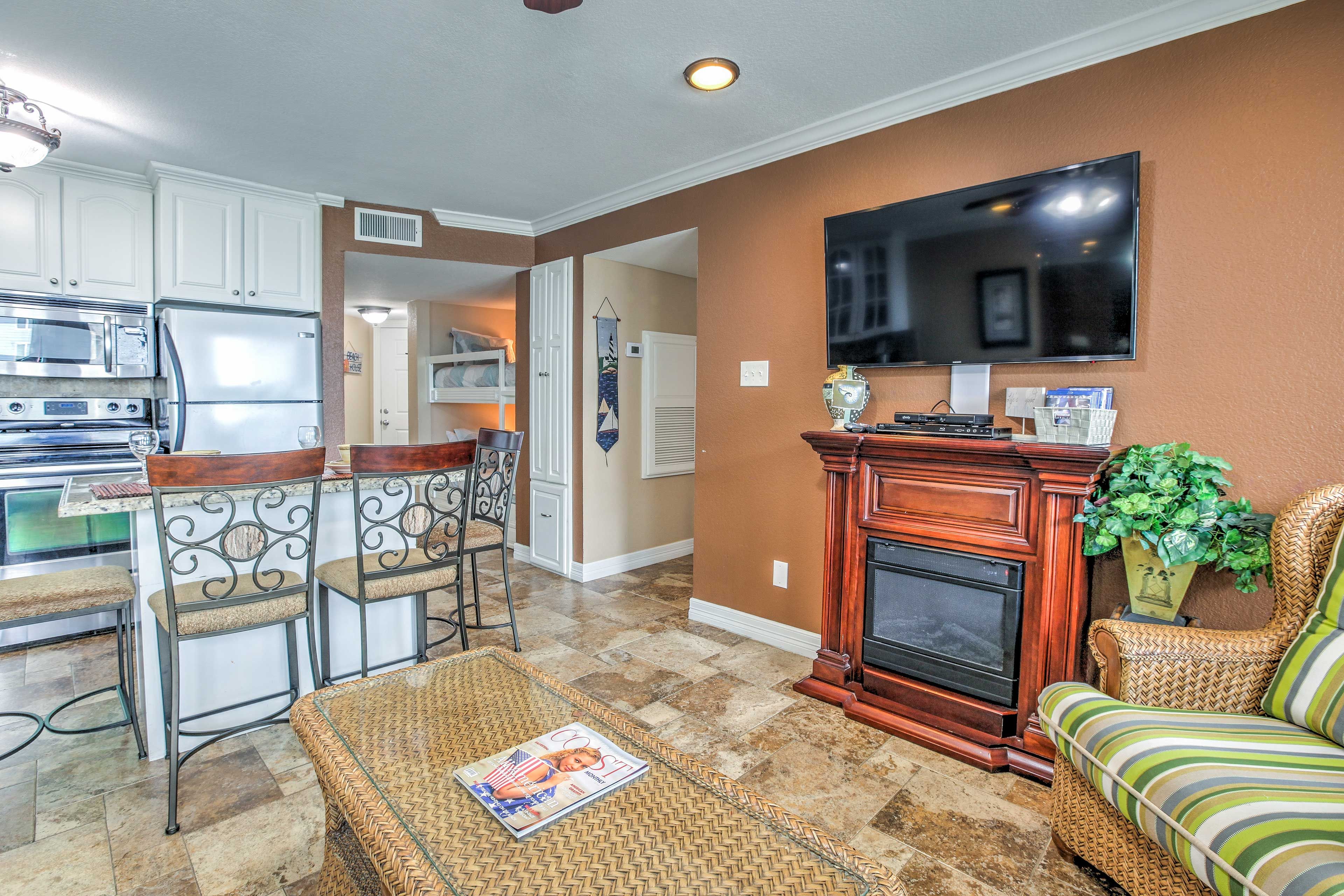 Enjoy a movie on the flat-screen TV.