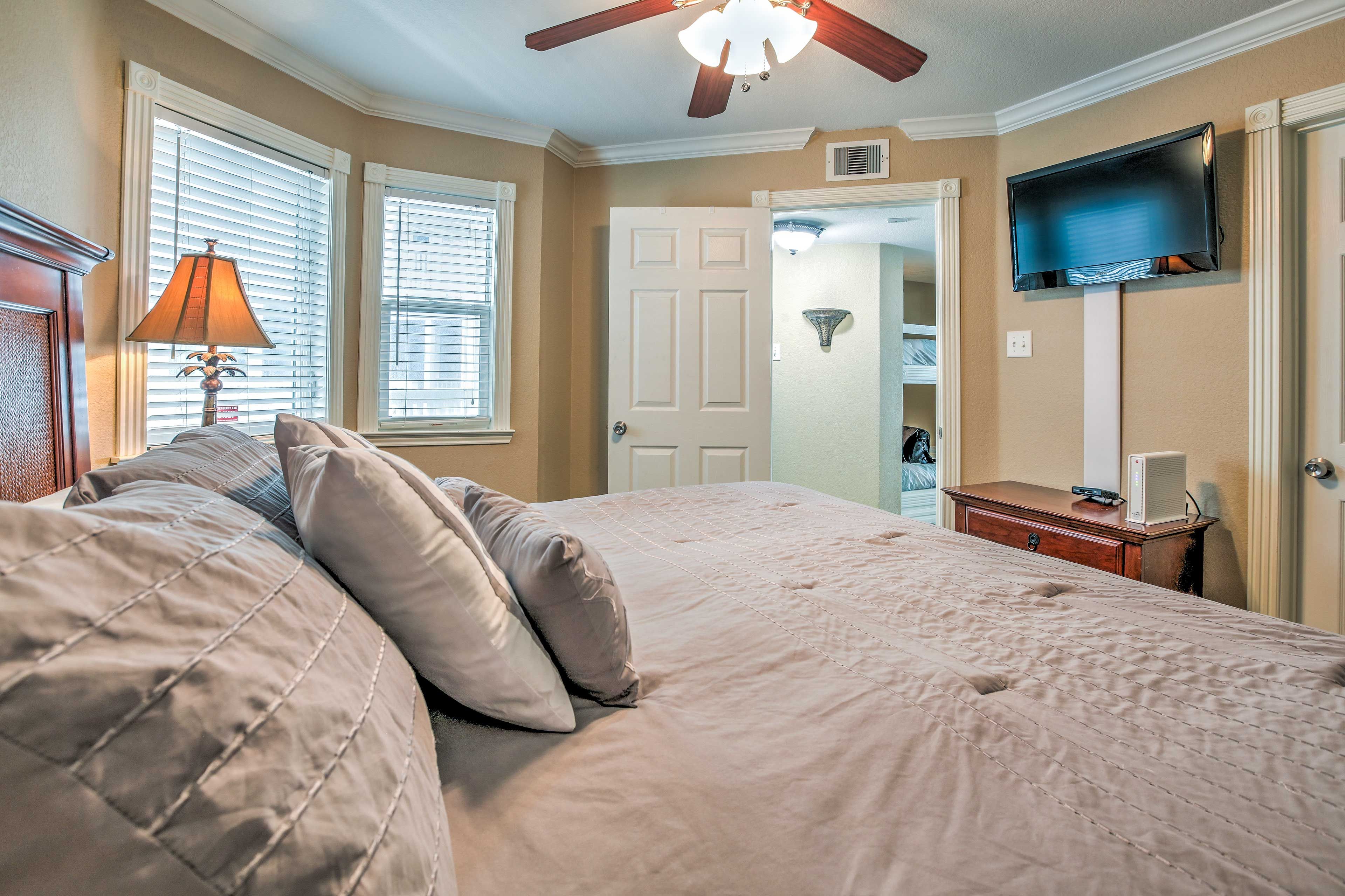 A flat-screen cable TV is mounted on the wall for your viewing pleasure.