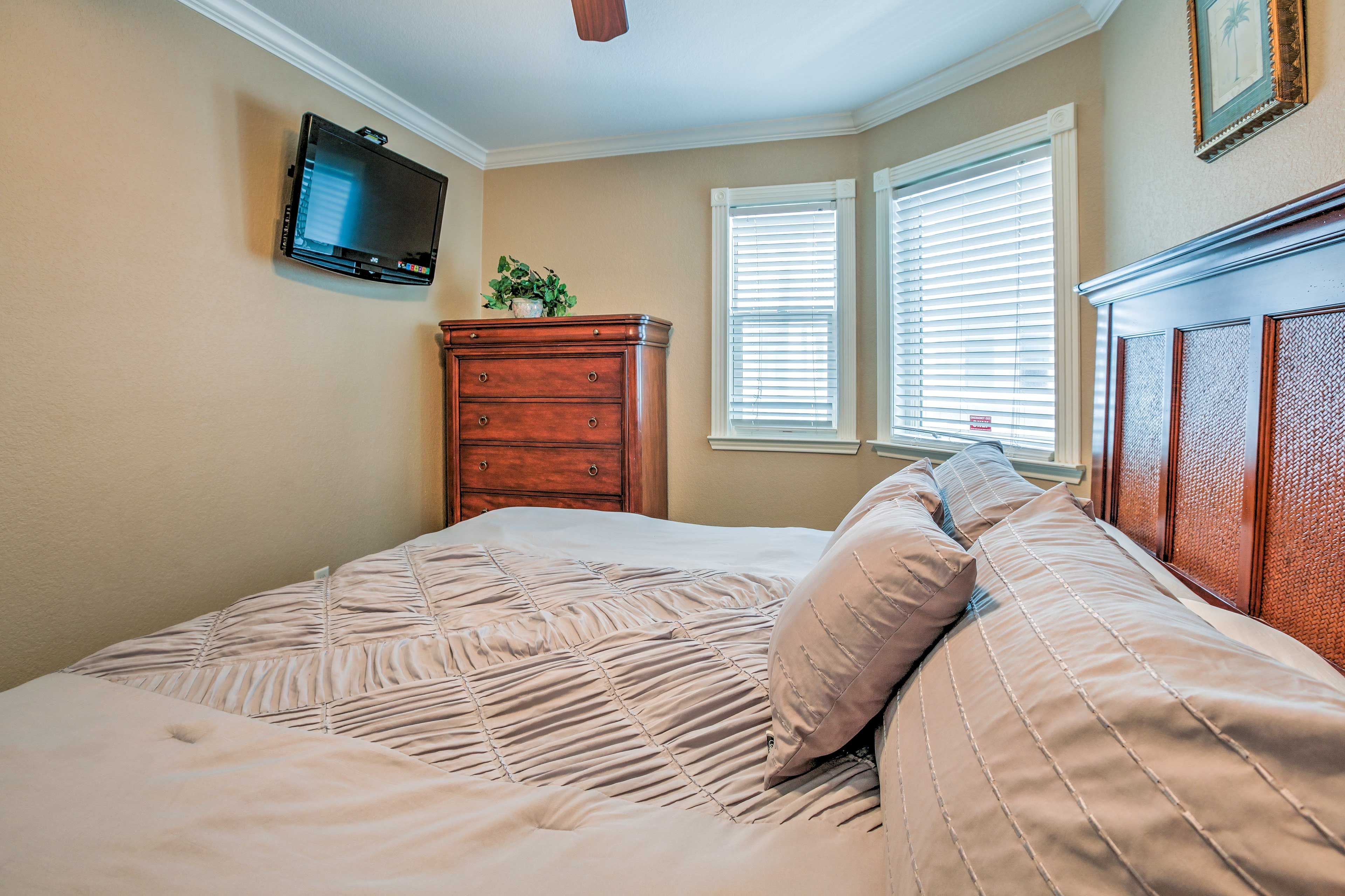 Fall asleep to the sound of your favorite movie on the flat-screen cable TV.