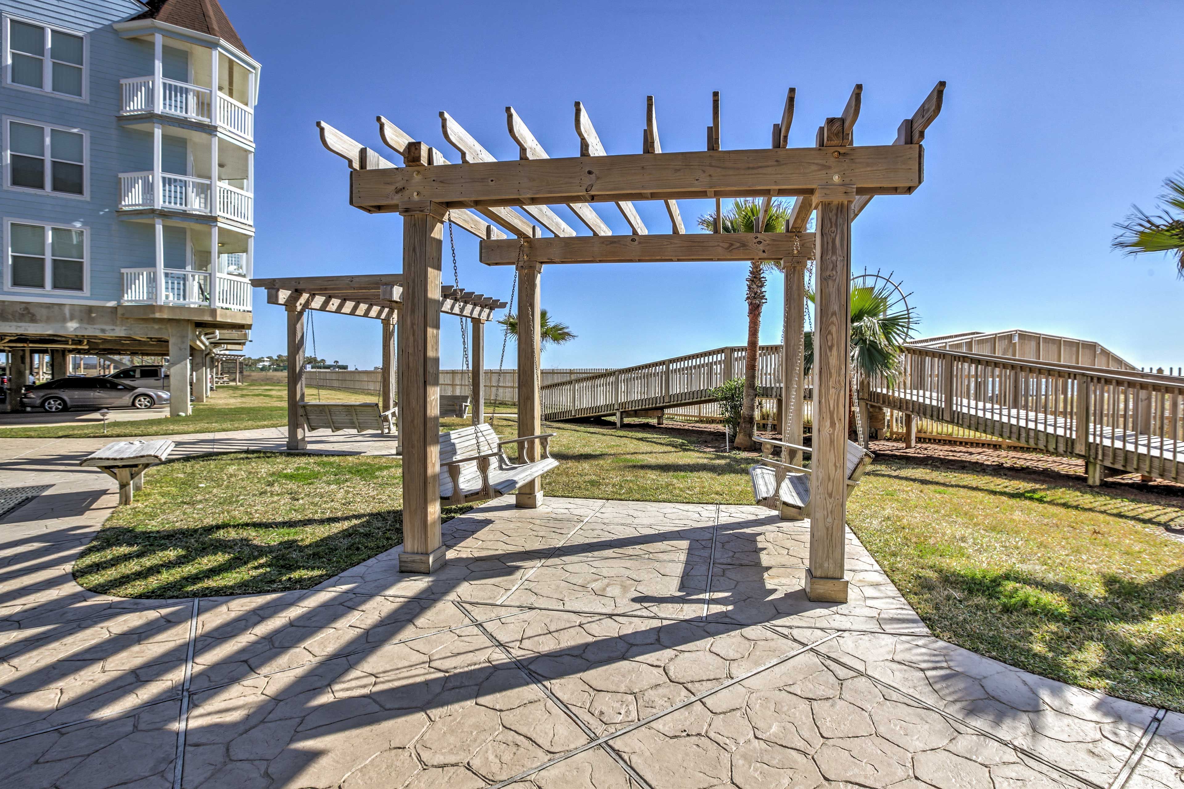 Enjoy the weather under the pergola.