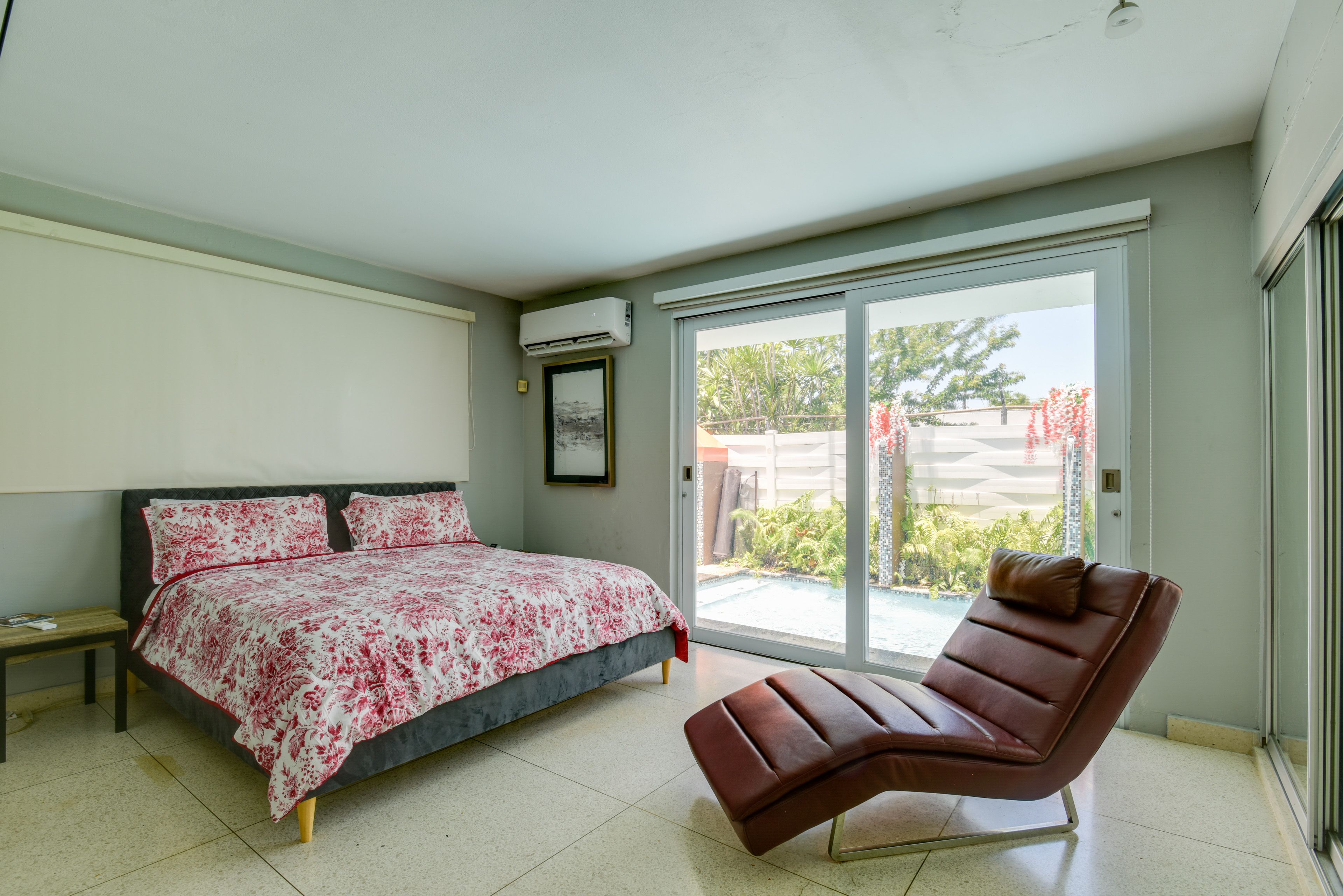 Bedroom 1 | King Bed | En-Suite Bathroom | Patio Access | 1st Floor
