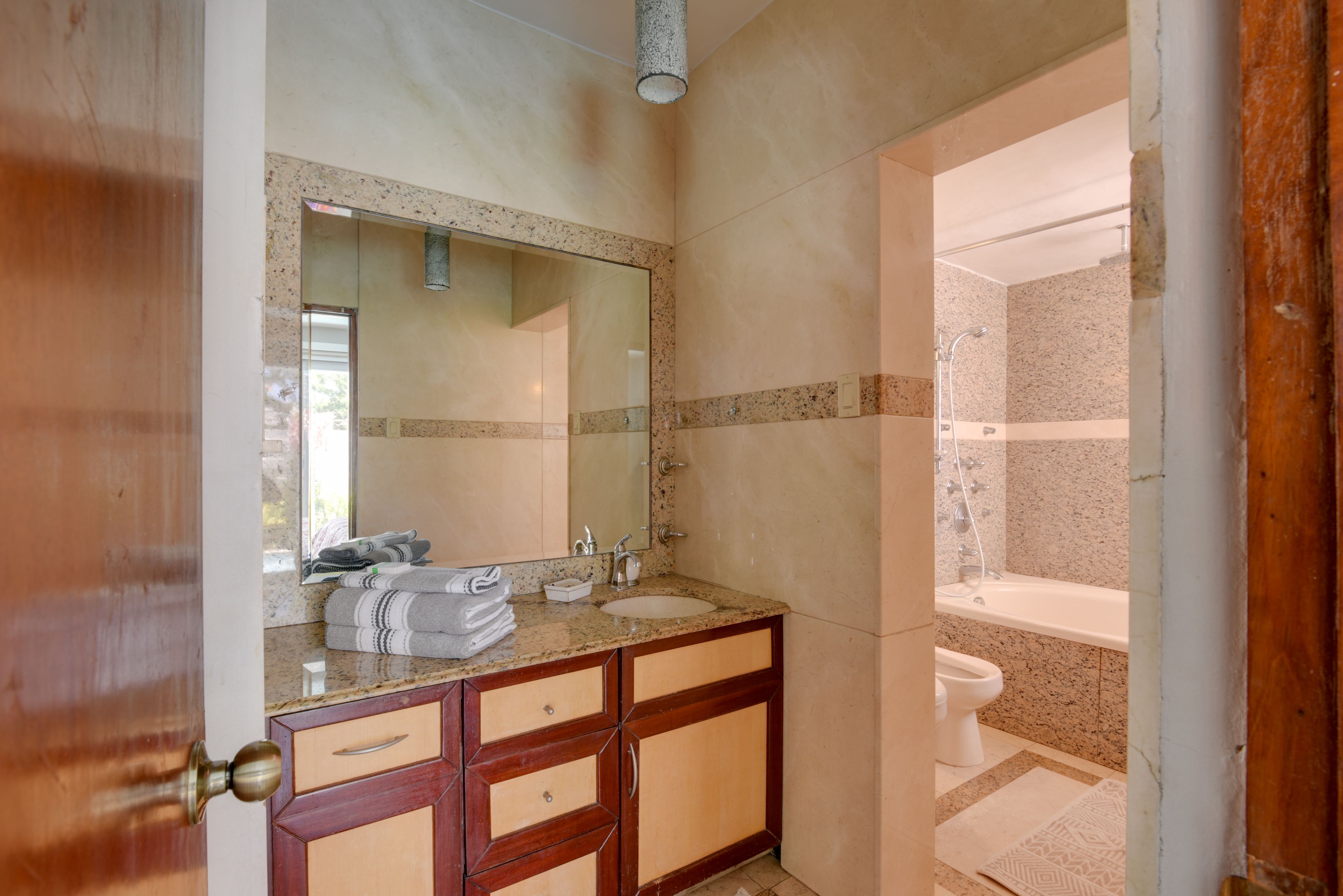En-Suite Bathroom | Towels & Linens Provided