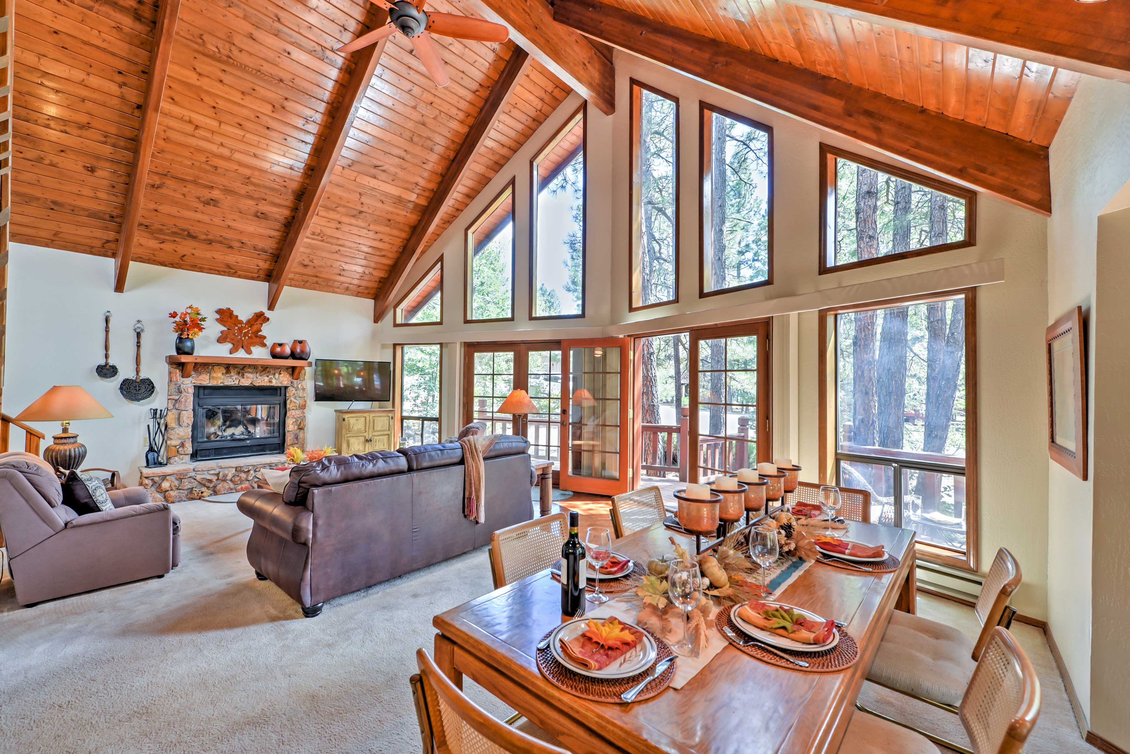 Natural light floods through a wall of windows.