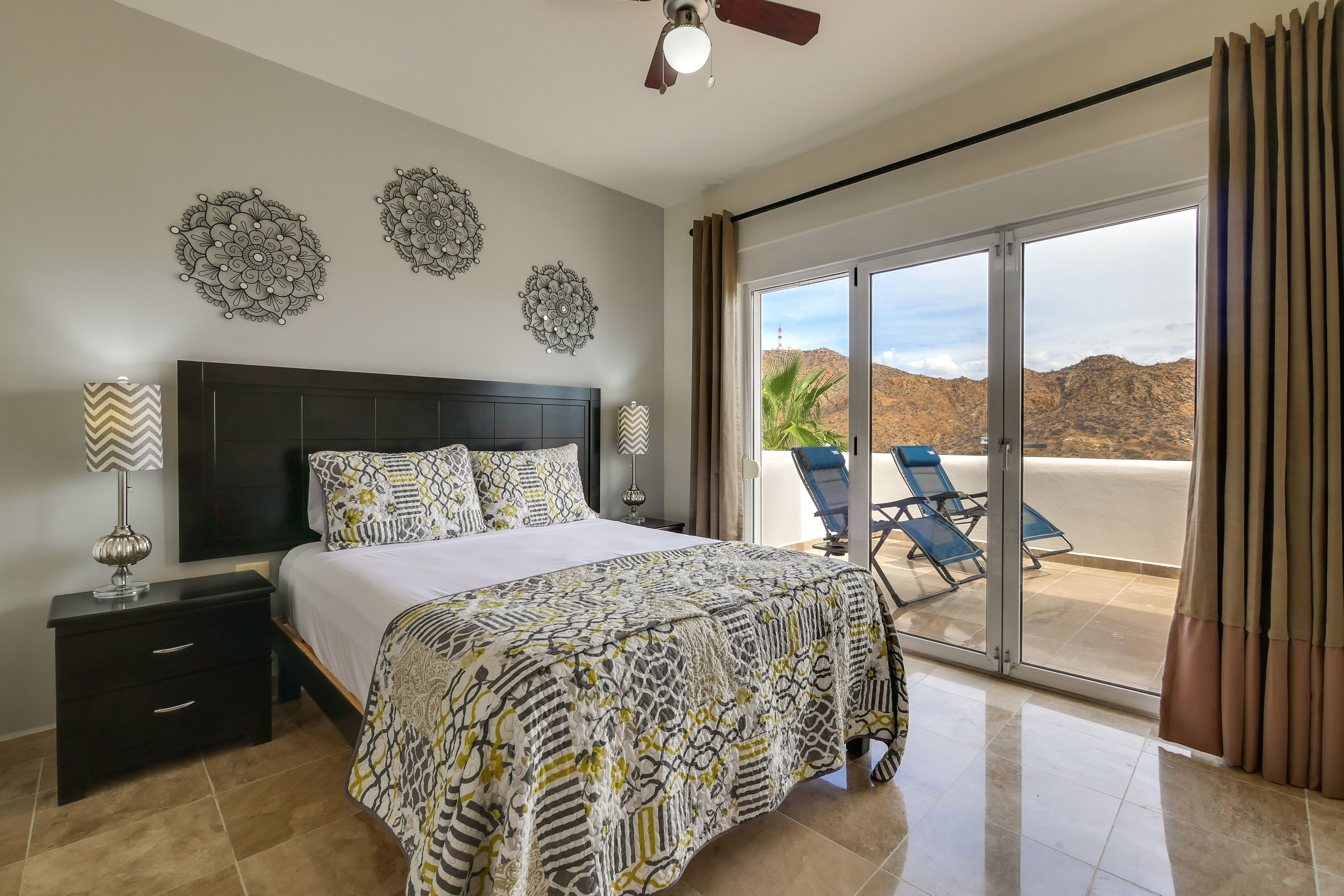 Bedroom 1 | Queen Bed | Balcony Access | En-Suite Bathroom