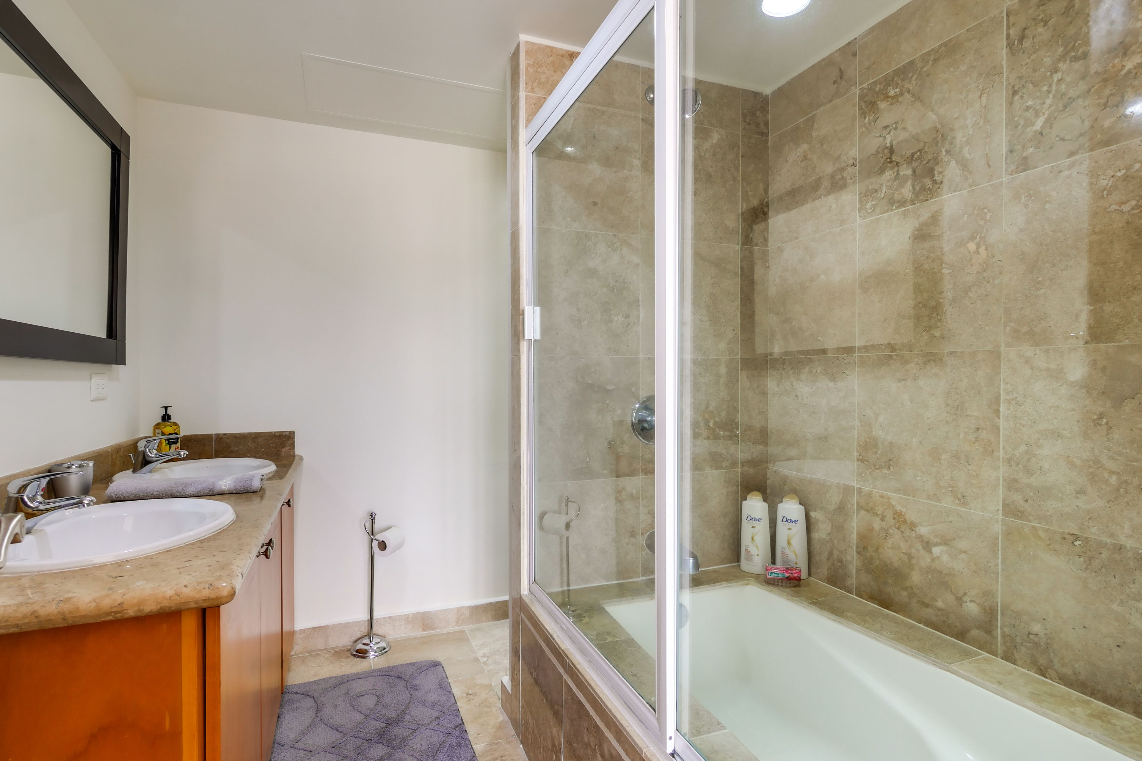 En-Suite Bathroom | Towels & Linens Provided
