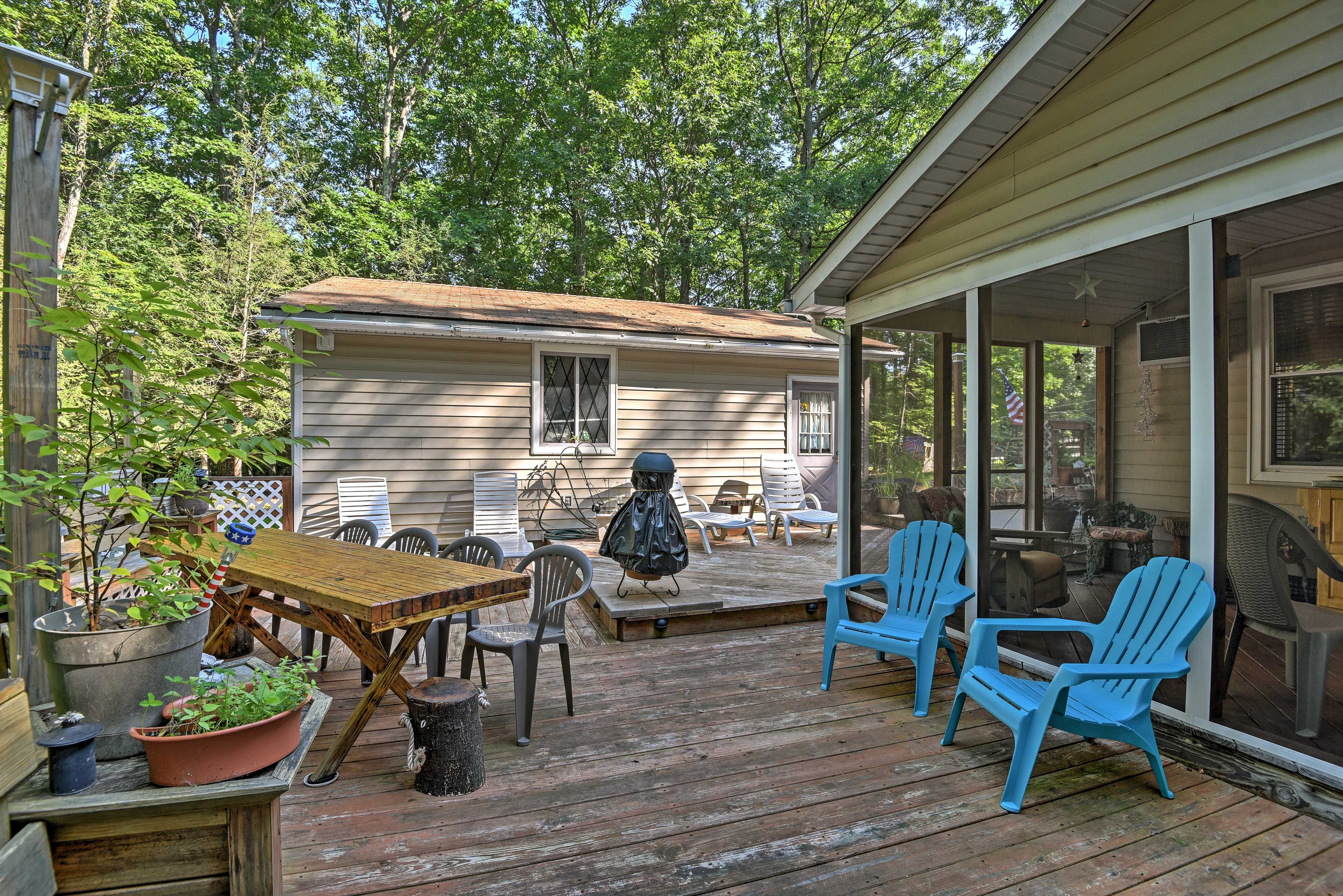 Sit in the Adirondack chairs and enjoy the lush foliage surrounding you.