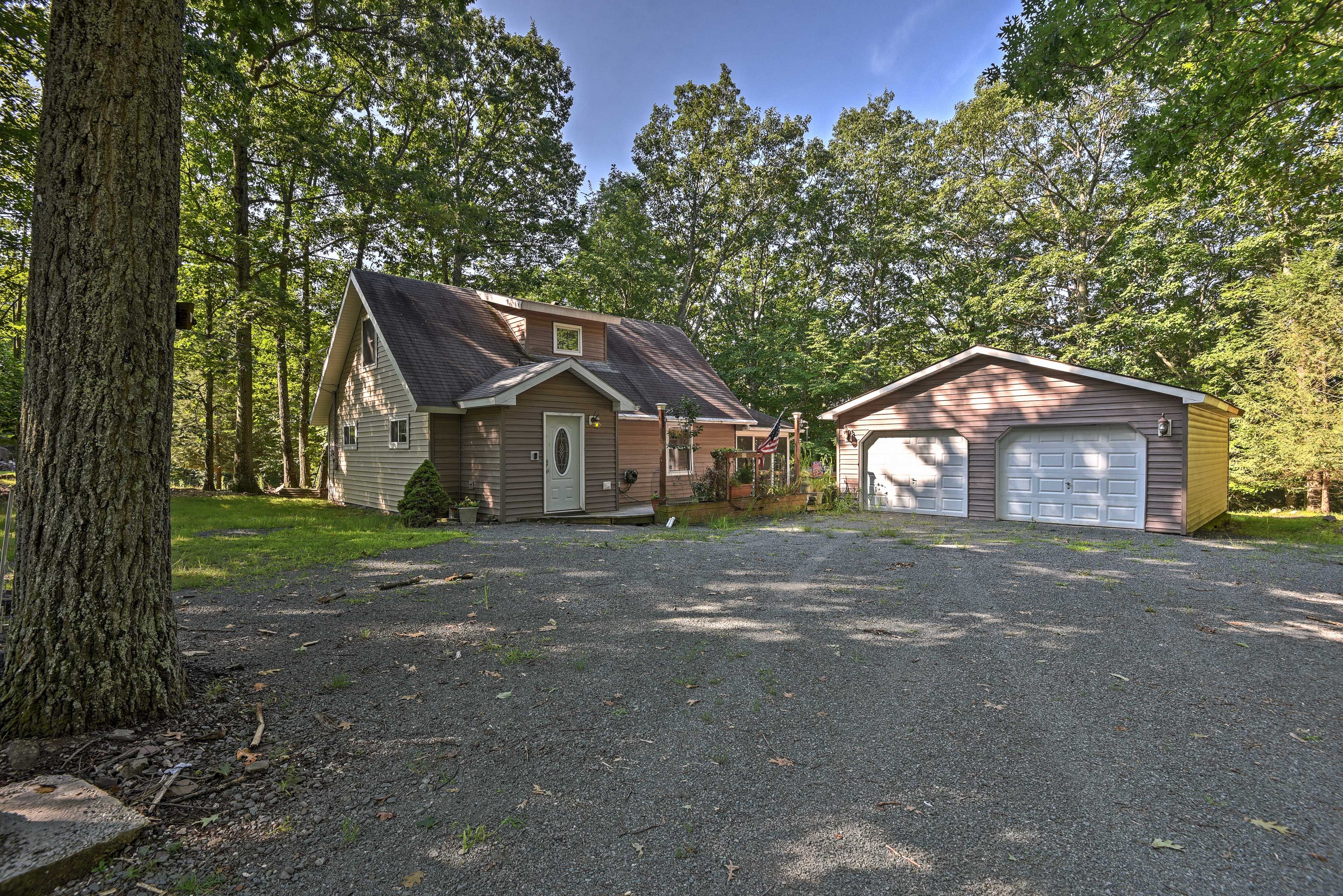 The property offers a plethora of parking spaces in the driveway.