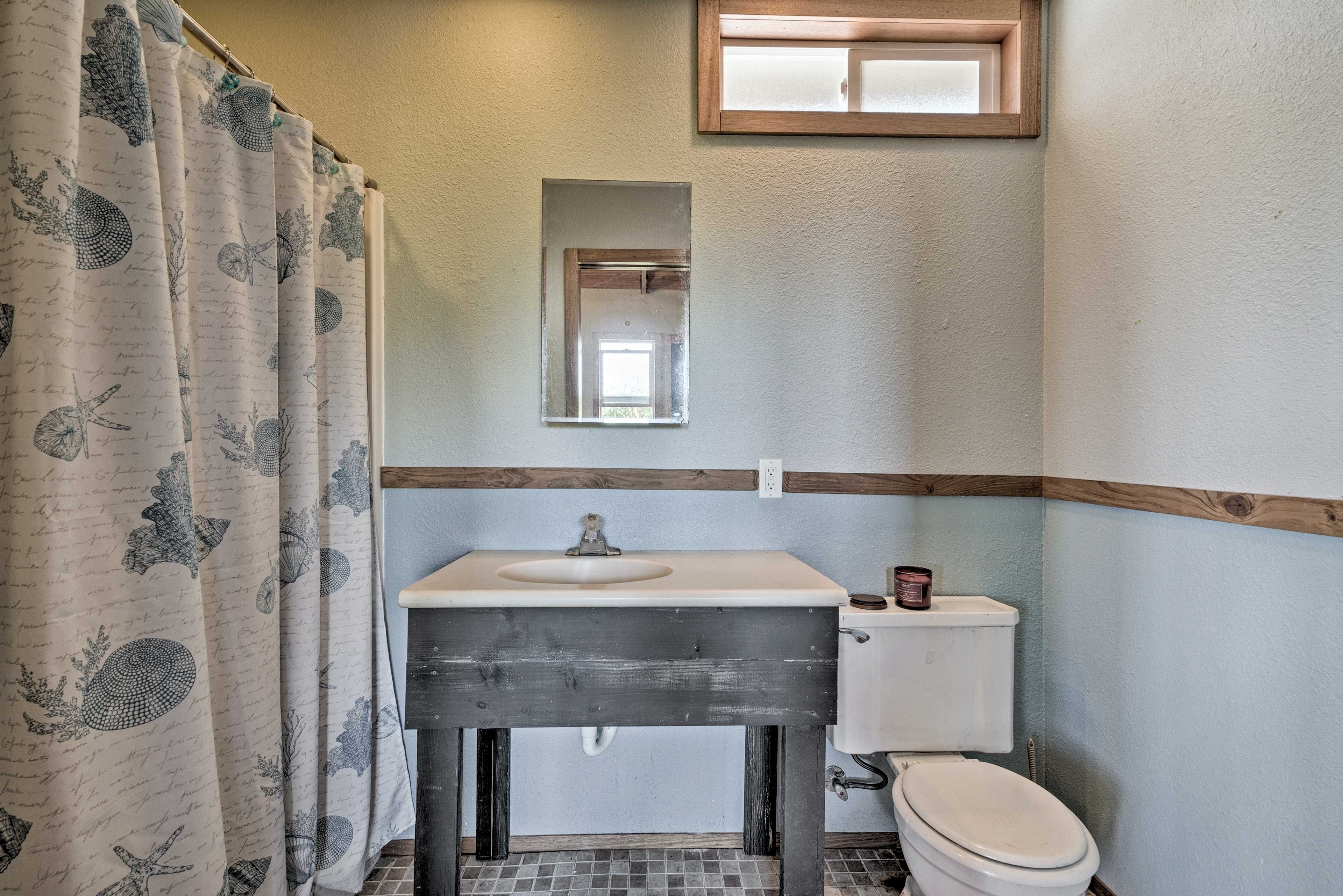 Soak your sun-kissed legs in the shower/tub combo.