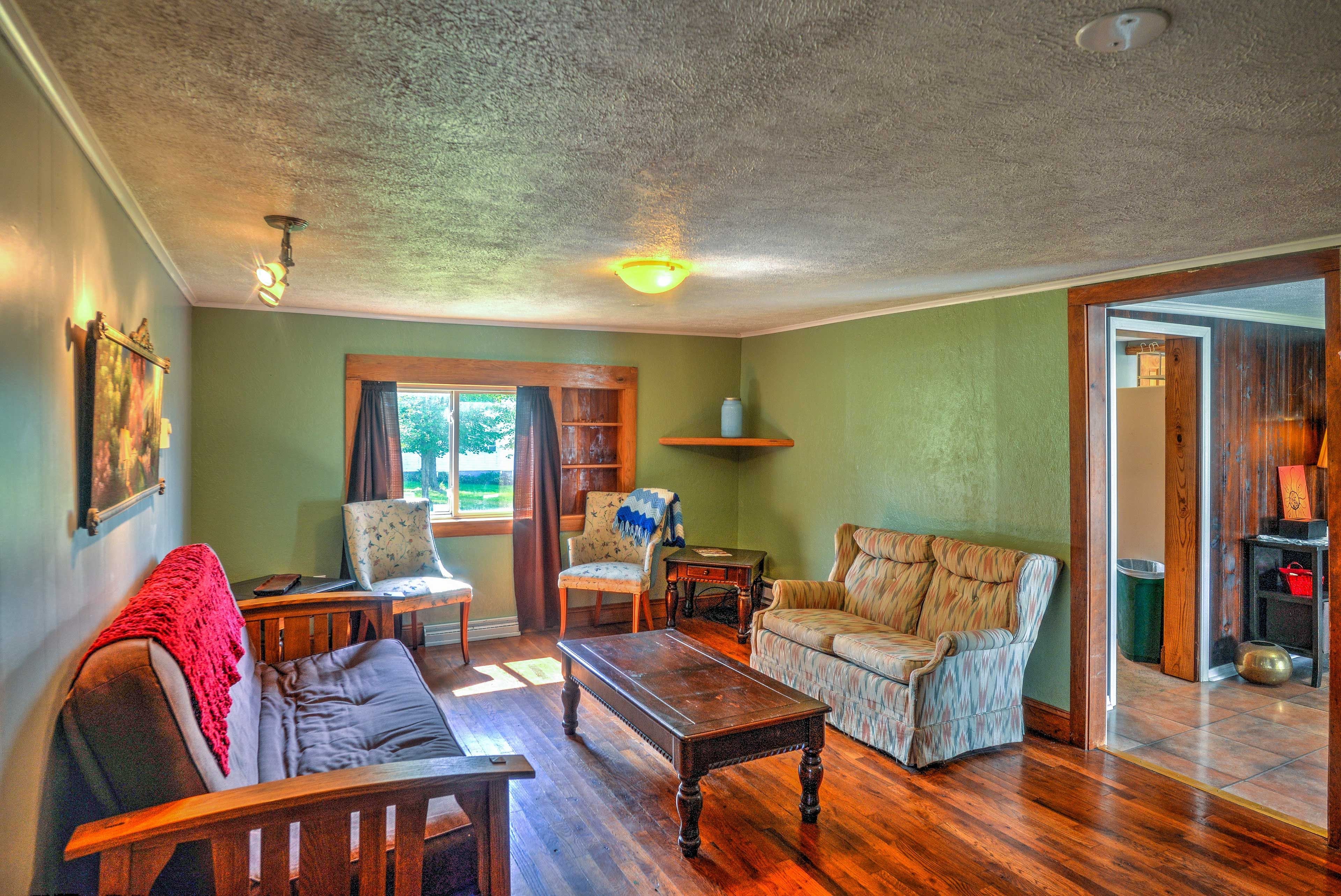 Two guests can sleep on the pullout bed in the living room.