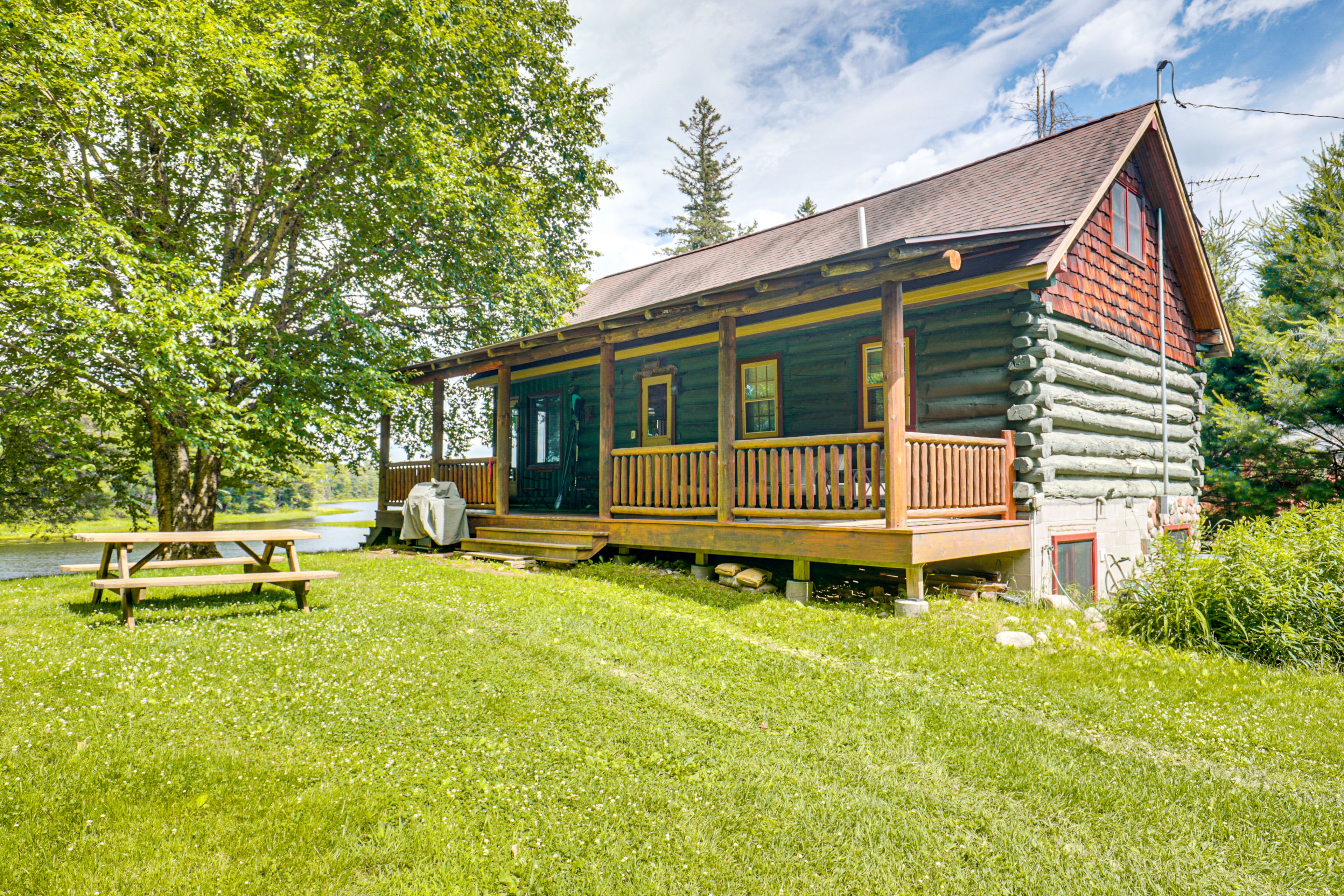 Property Exterior | 3-Story Cabin | Covered Porch | Picnic Area | Grill