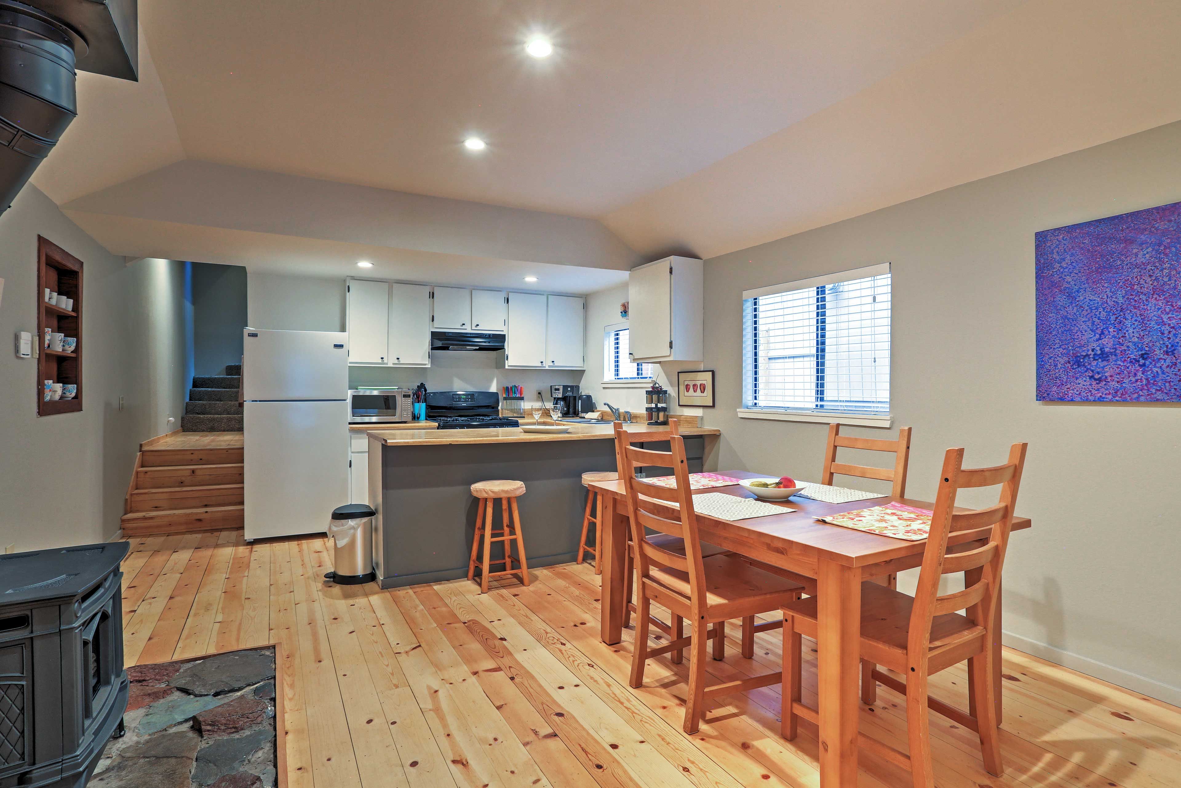 Share meals around the 4-person table or breakfast bar.