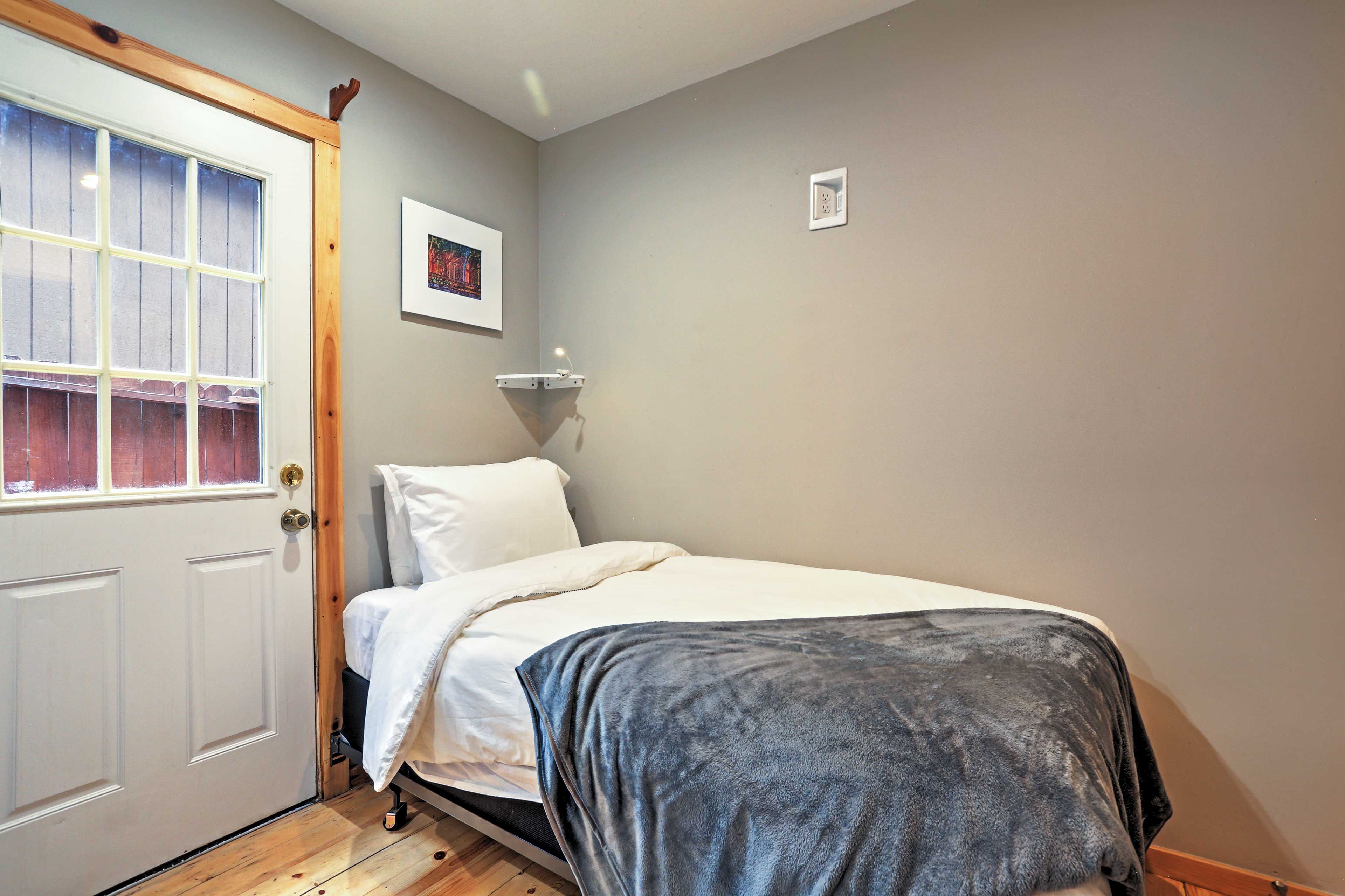 The second bedroom offers 2 twin-sized beds.