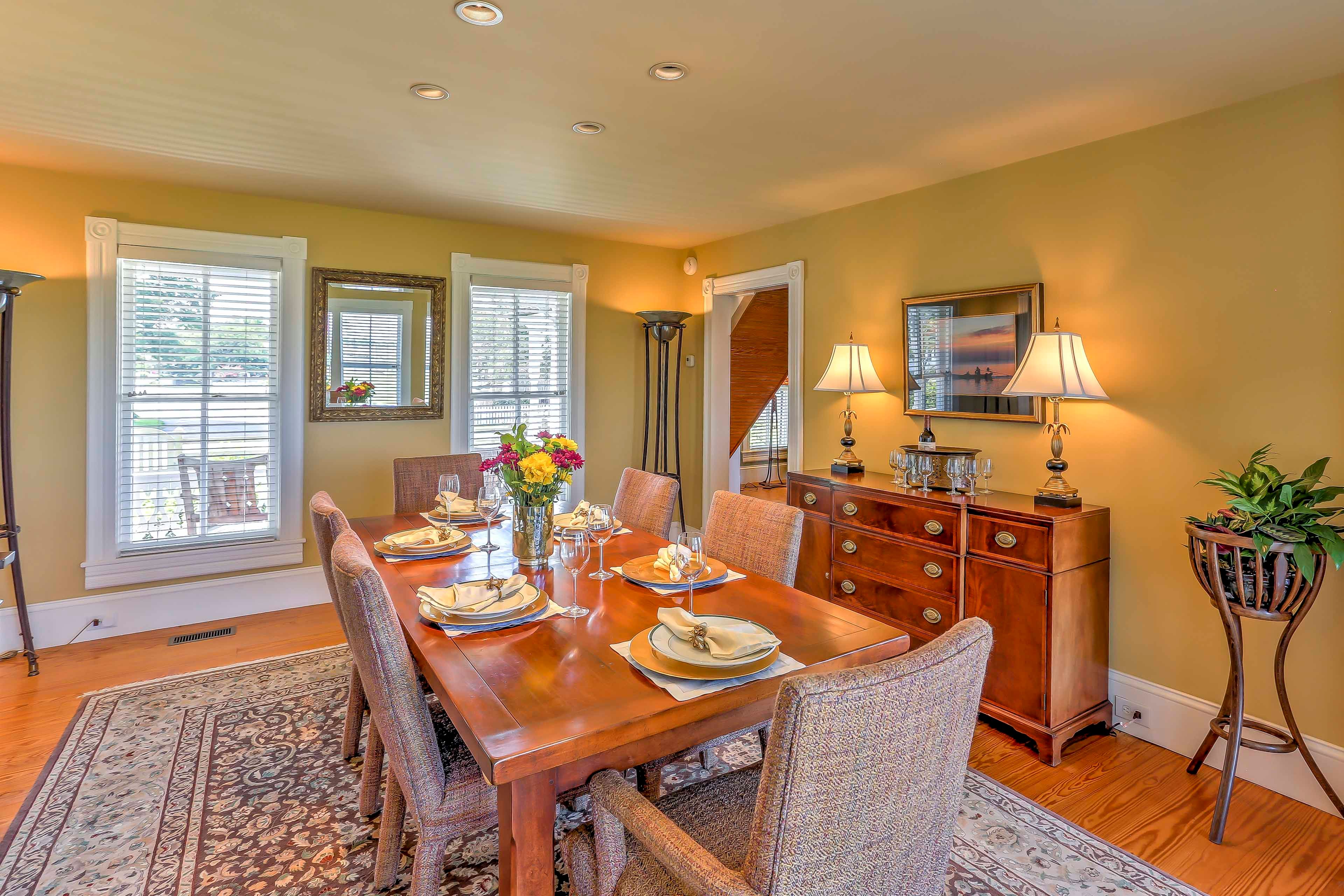 Enjoy a good meal surrounded by great company at this dining table set for 6.
