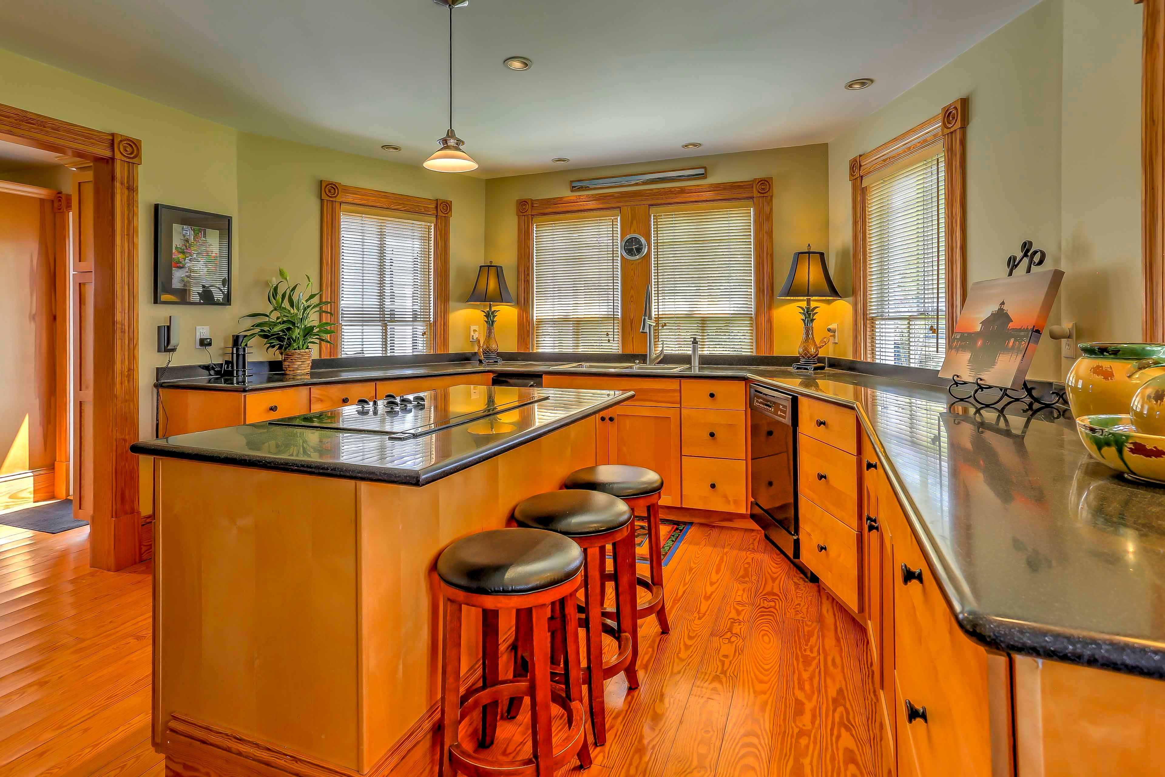 The kitchen boasts top quality appliances and a spacious center island.