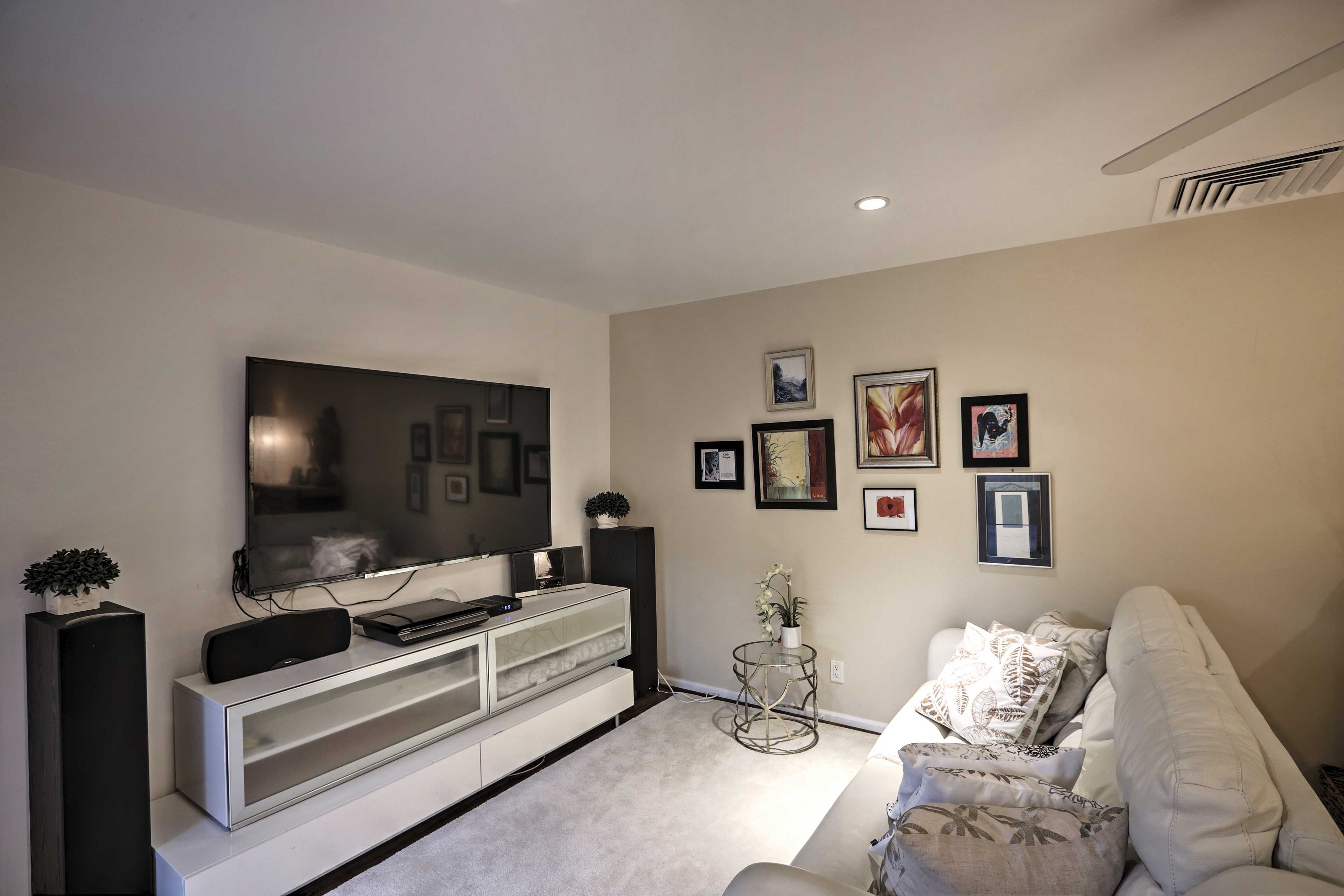 Stream your favorite shows on the 50-inch flat-screen Smart TV, equipped with Netflix and a DVD player.