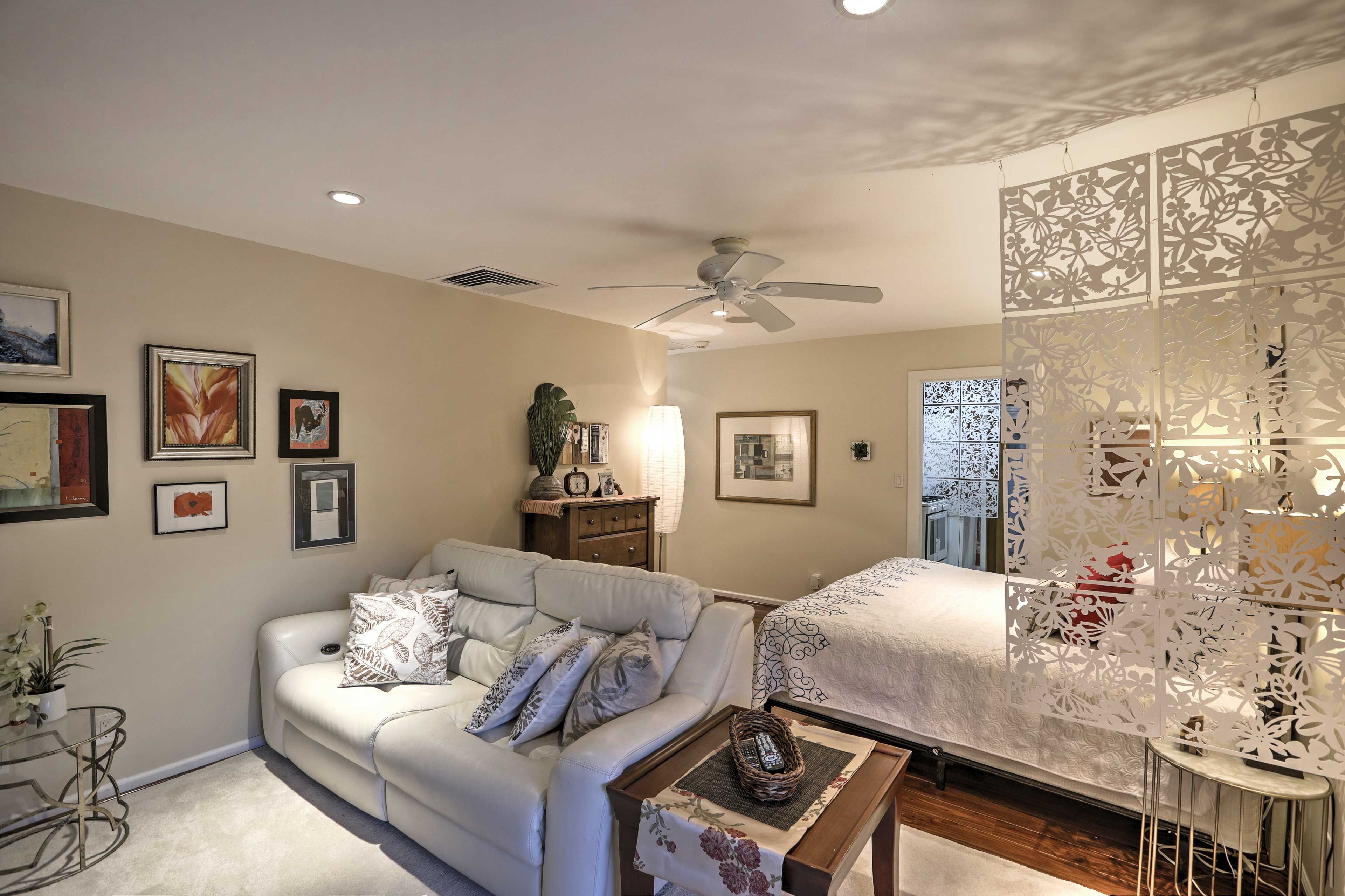 The leather sofa reclines into a bed.