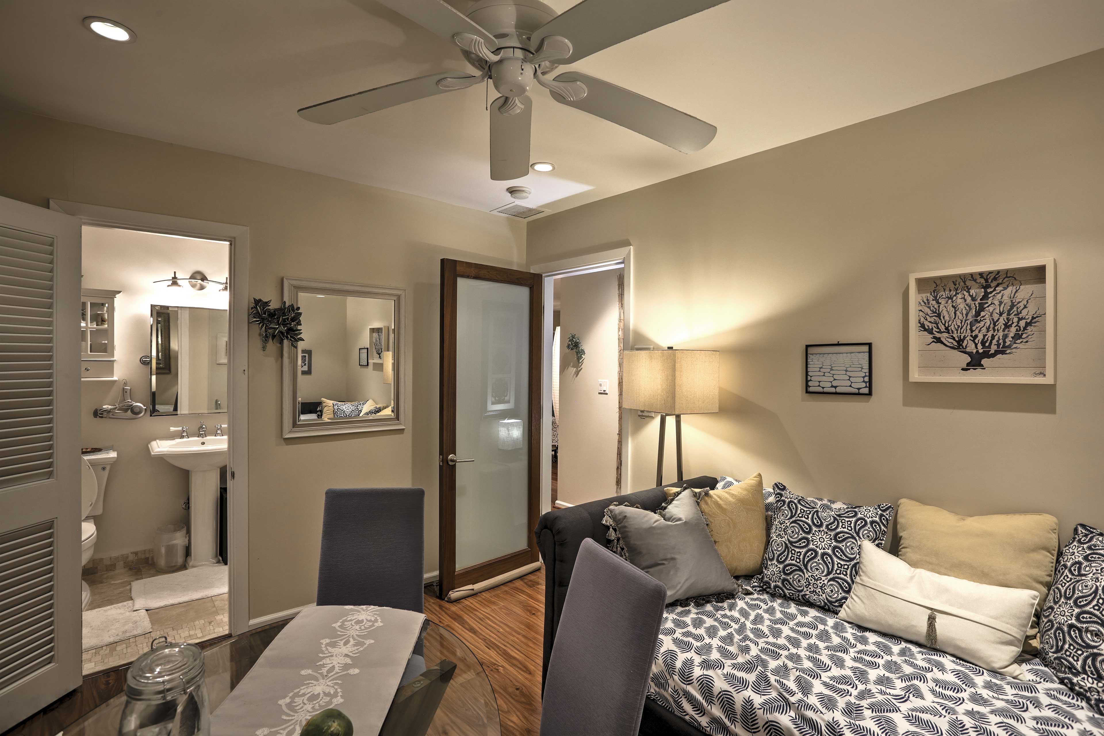 Fall asleep to the sound of a movie on a flat-screen cable TV, equipped with a DVD player.