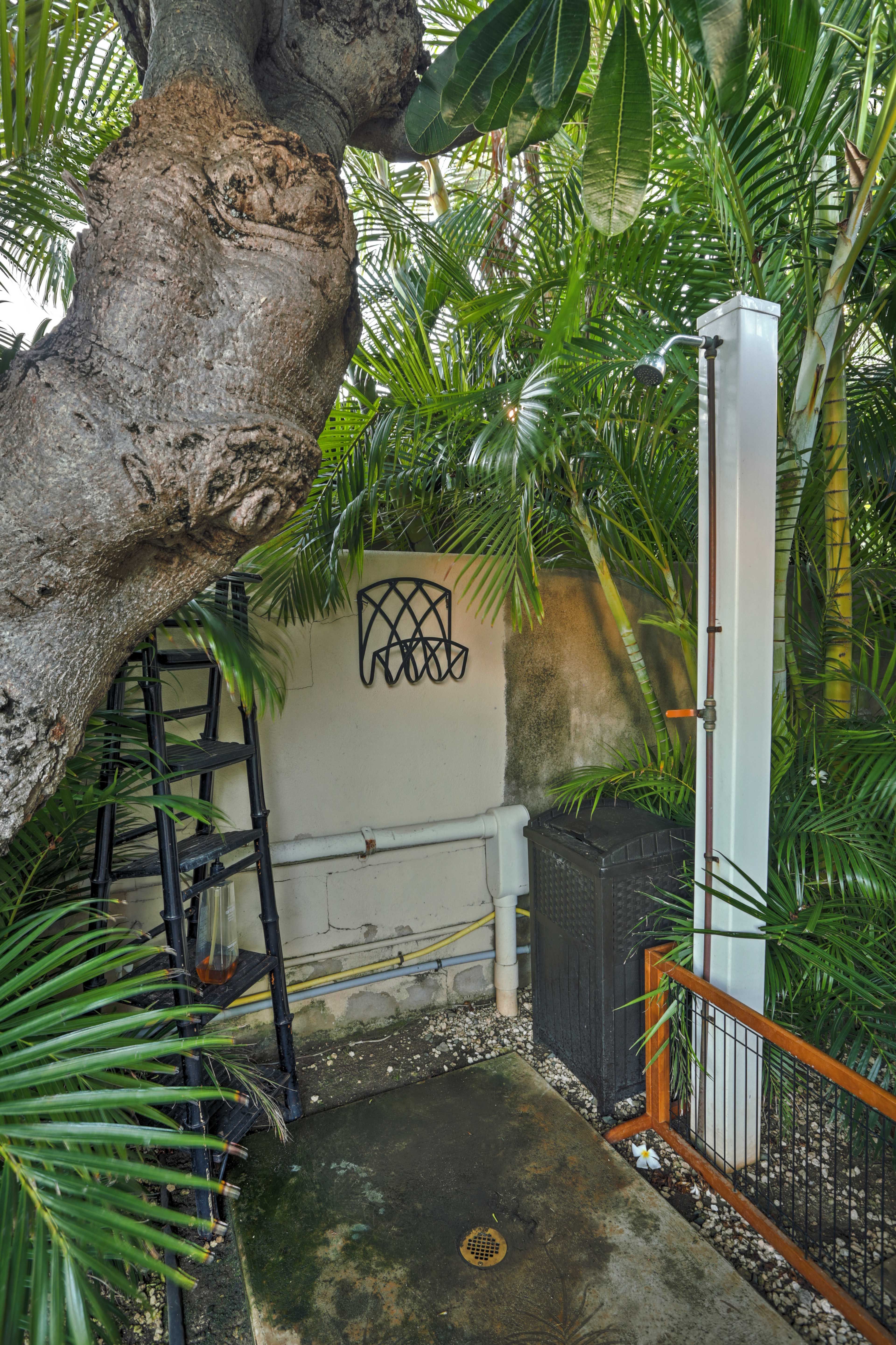 Rinse off in the outdoor shower after a day at the beach and keep the house sand free.