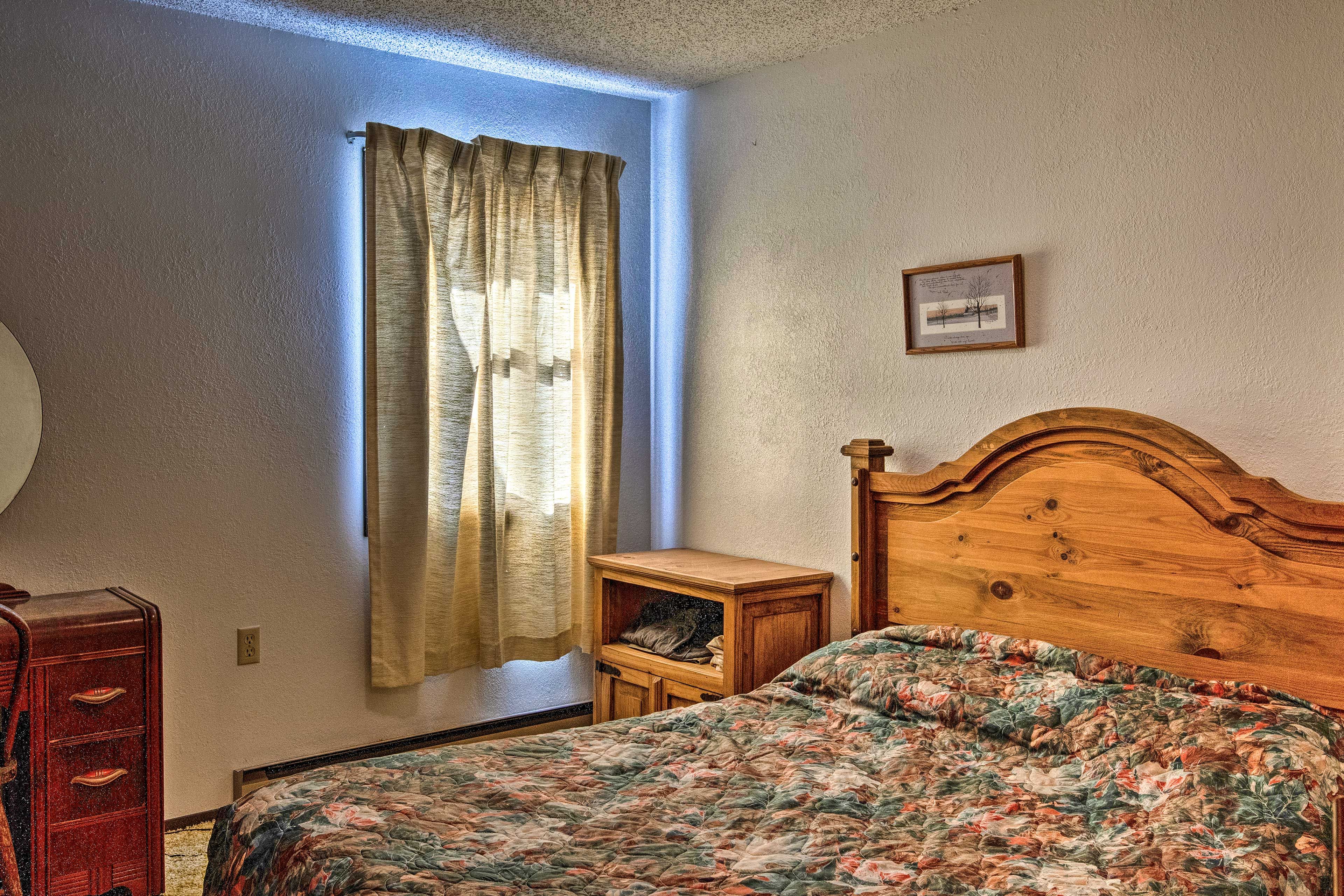 Cozy up on the full-sized bed at night.