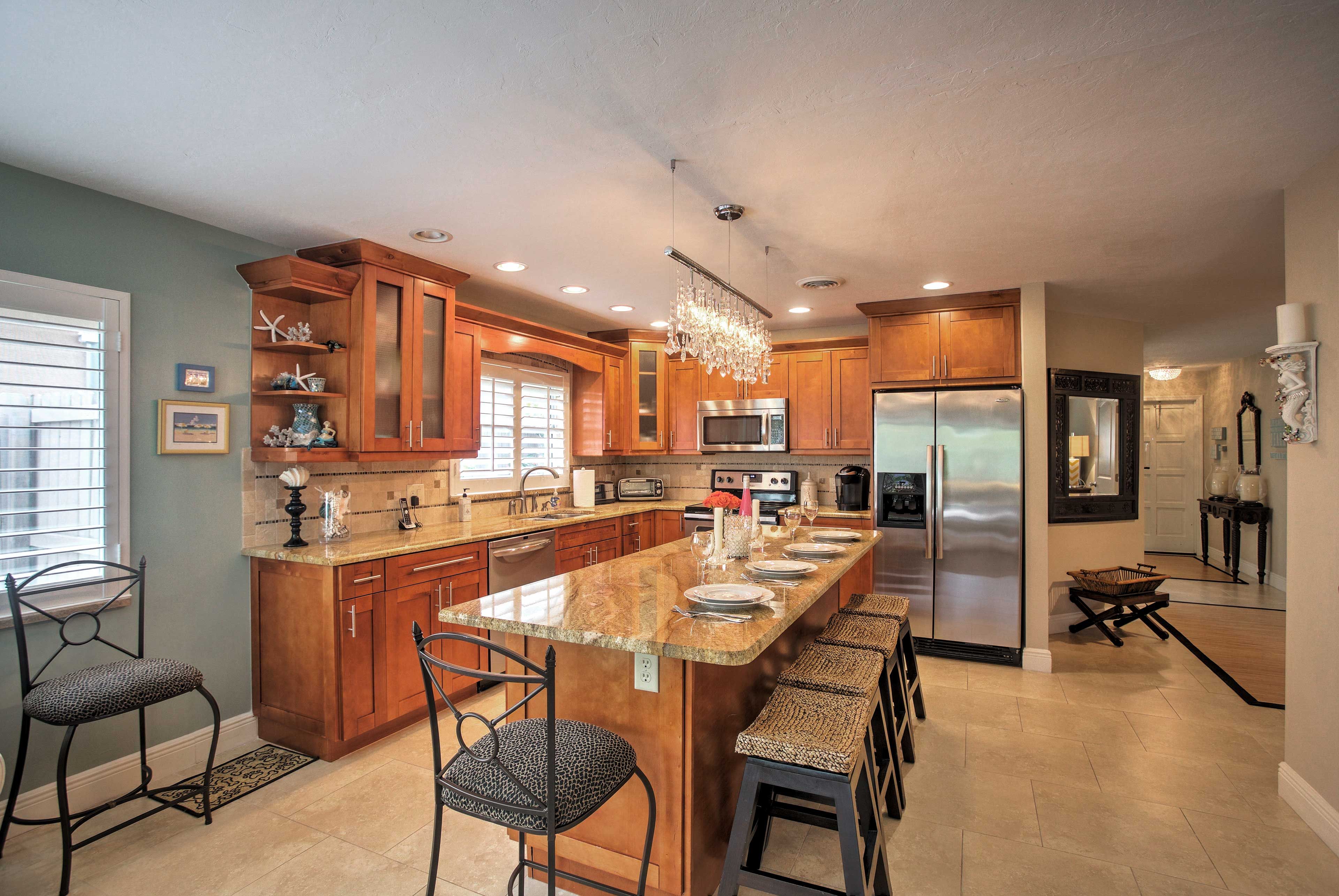Gather everyone at the granite kitchen bar for snacks and gourmet feasts.
