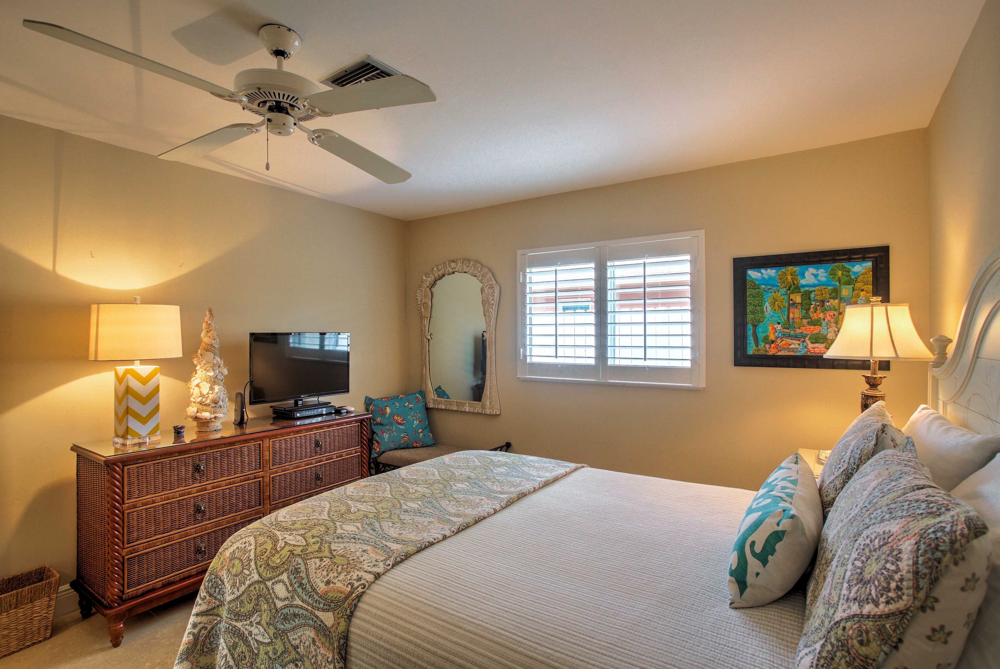 You'll sleep soundly  in the plush queen bed.