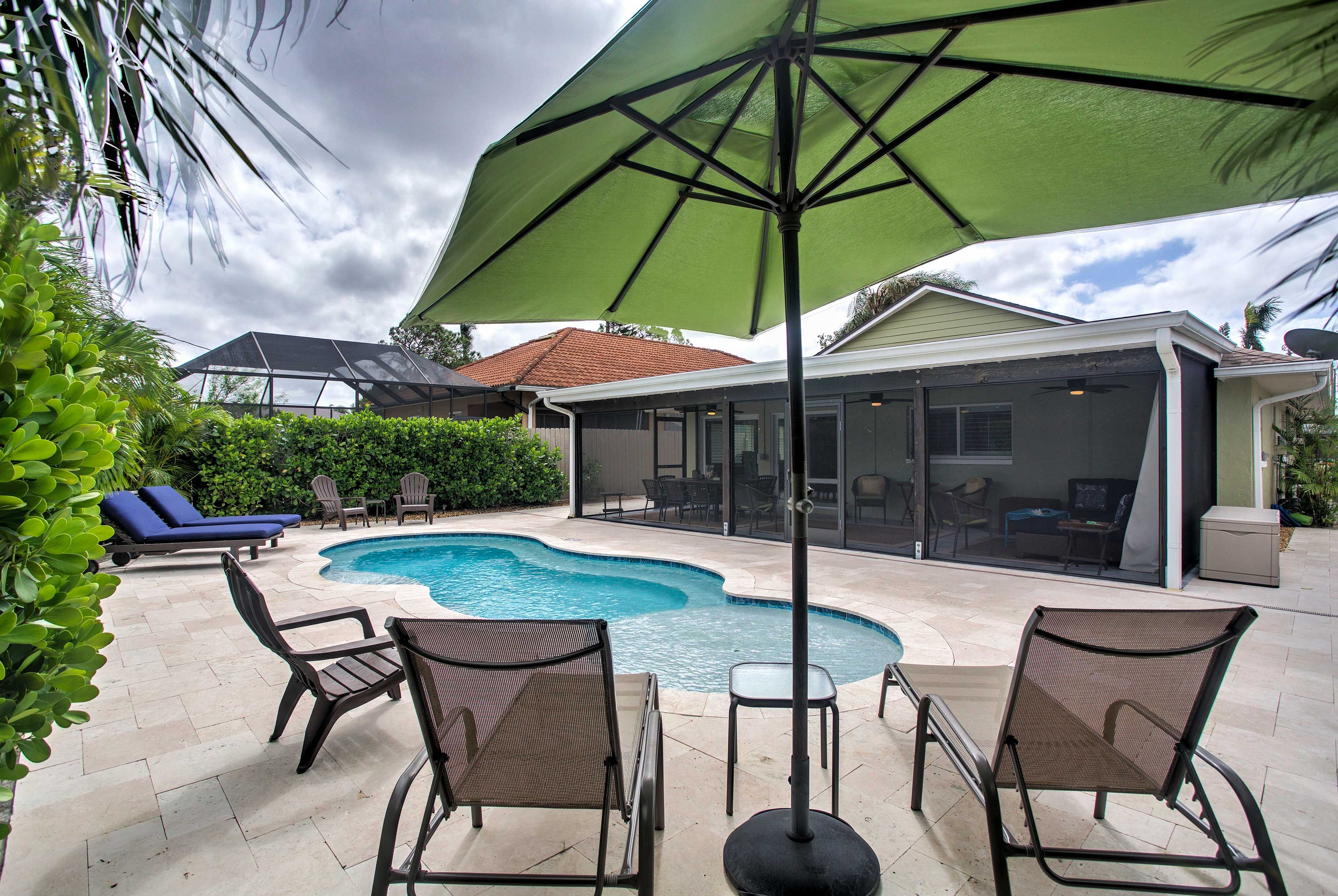 Sip a cocktail as you lounge poolside in the chaise chairs.