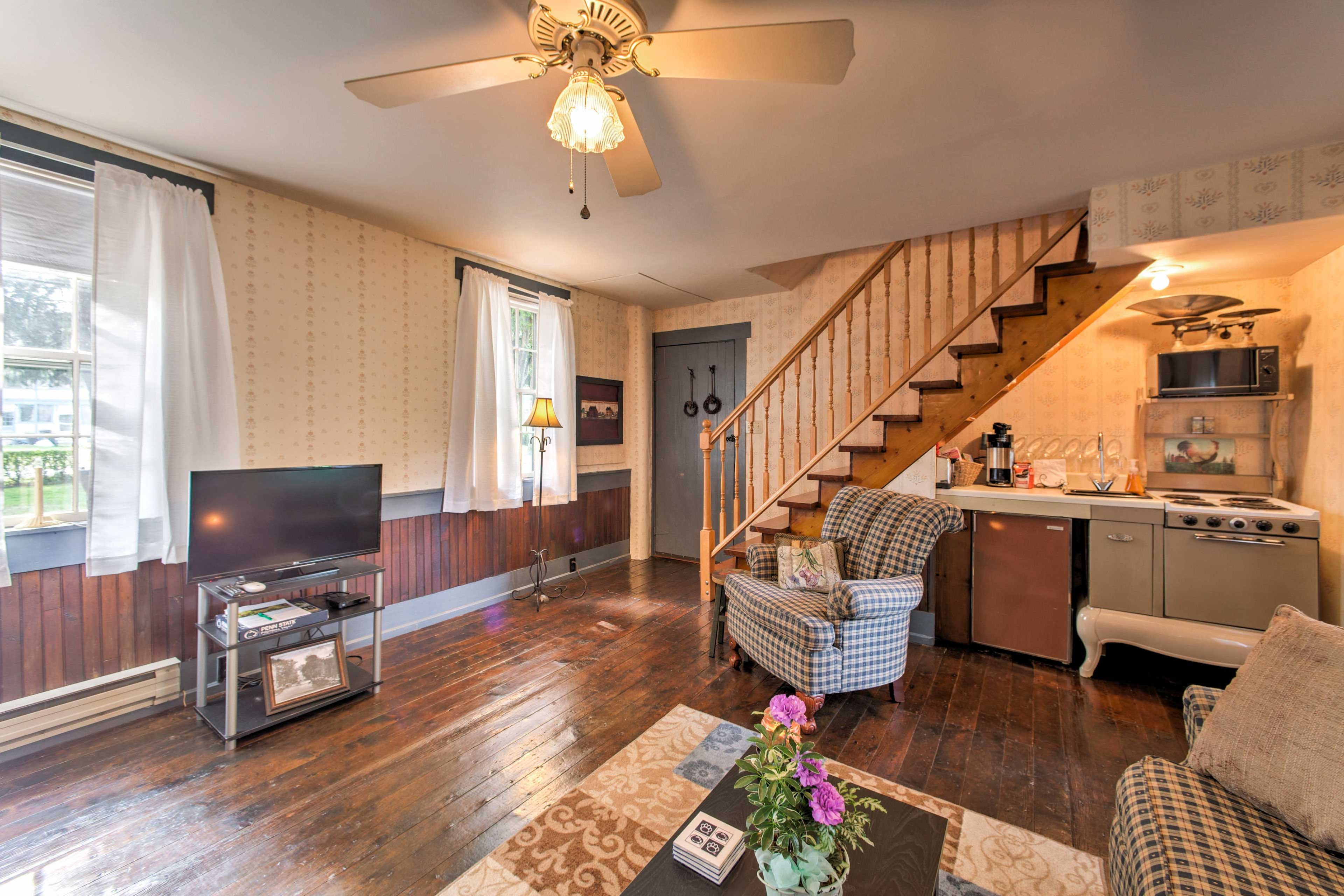 Lie back on the checkered furniture as you watch the flat-screen satellite TV.