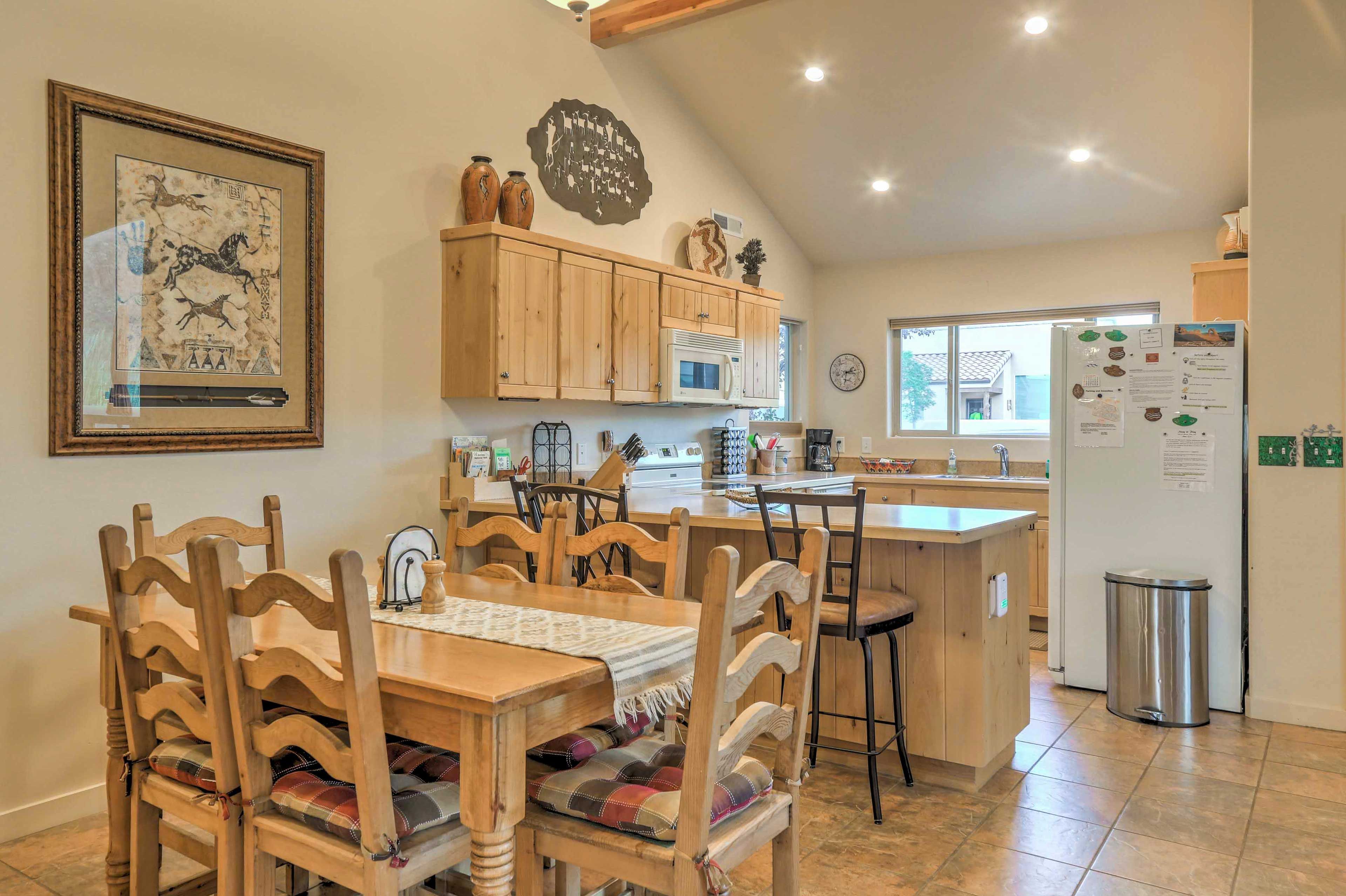 The dining area opens up into the kitchen.