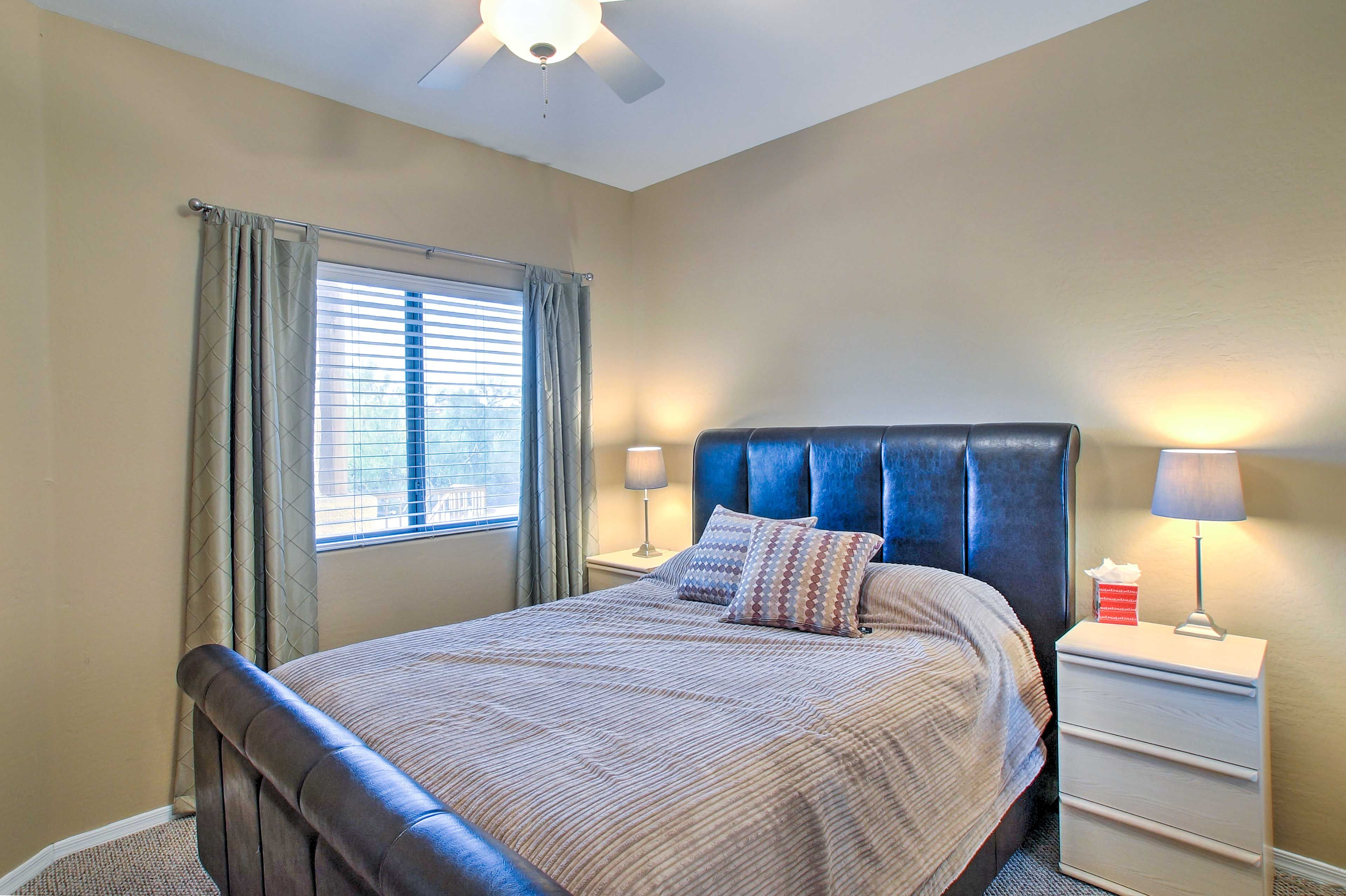 You'll sleep soundly in this cozy queen bed.