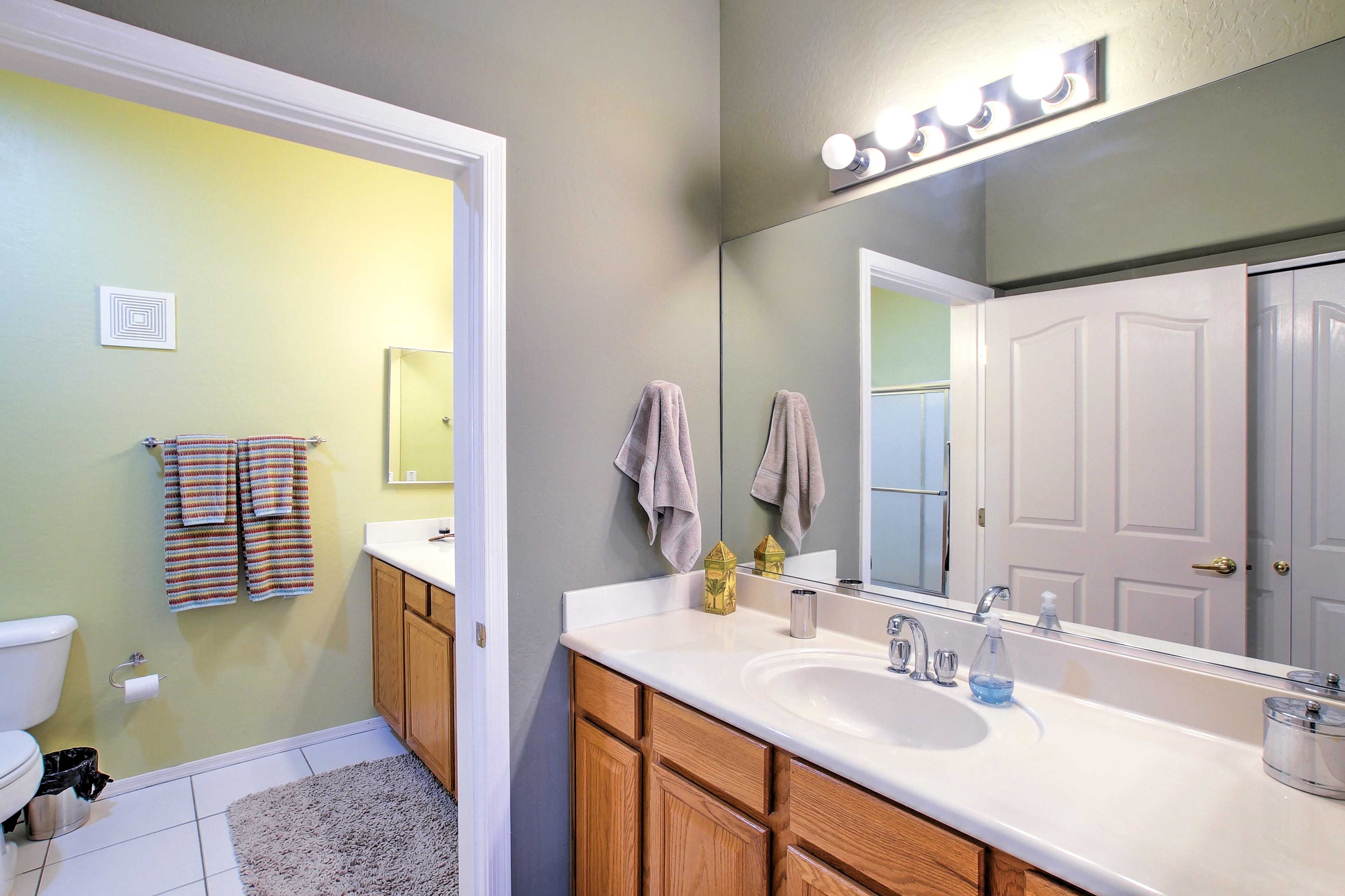 The double vanity provides ample counter space to couples.