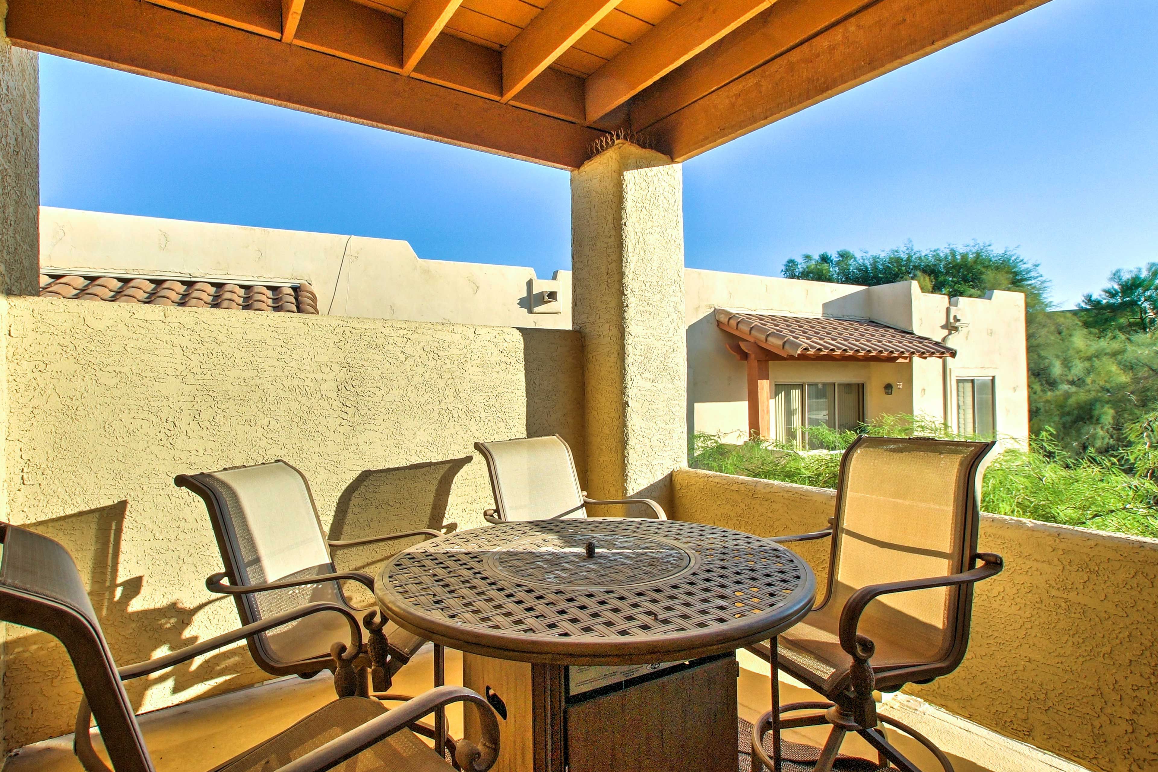 Sip a delicious cocktail while lounging on the covered balcony.