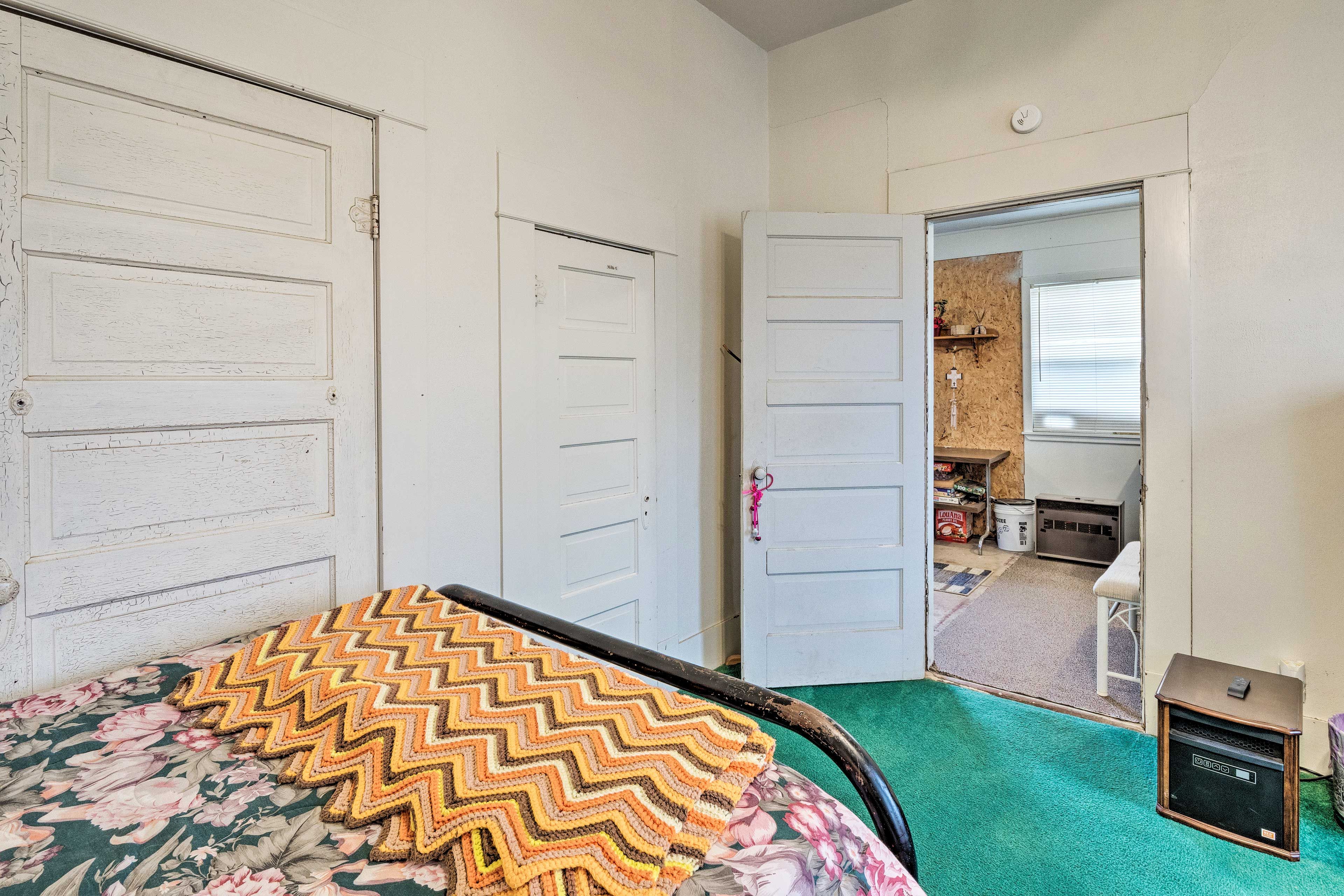 The rooms are separated by a door.