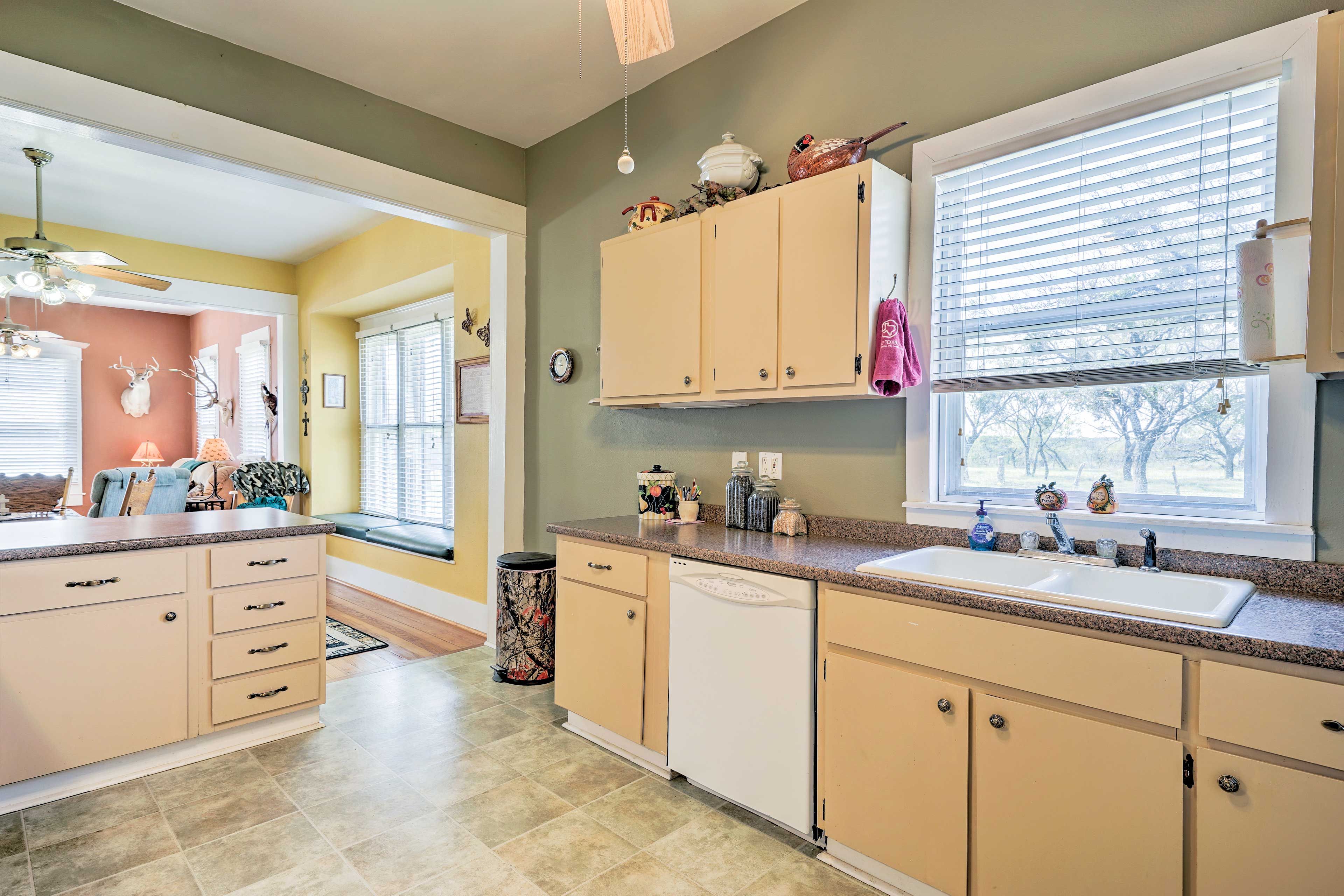 The fully equipped kitchen features wraparound counters.