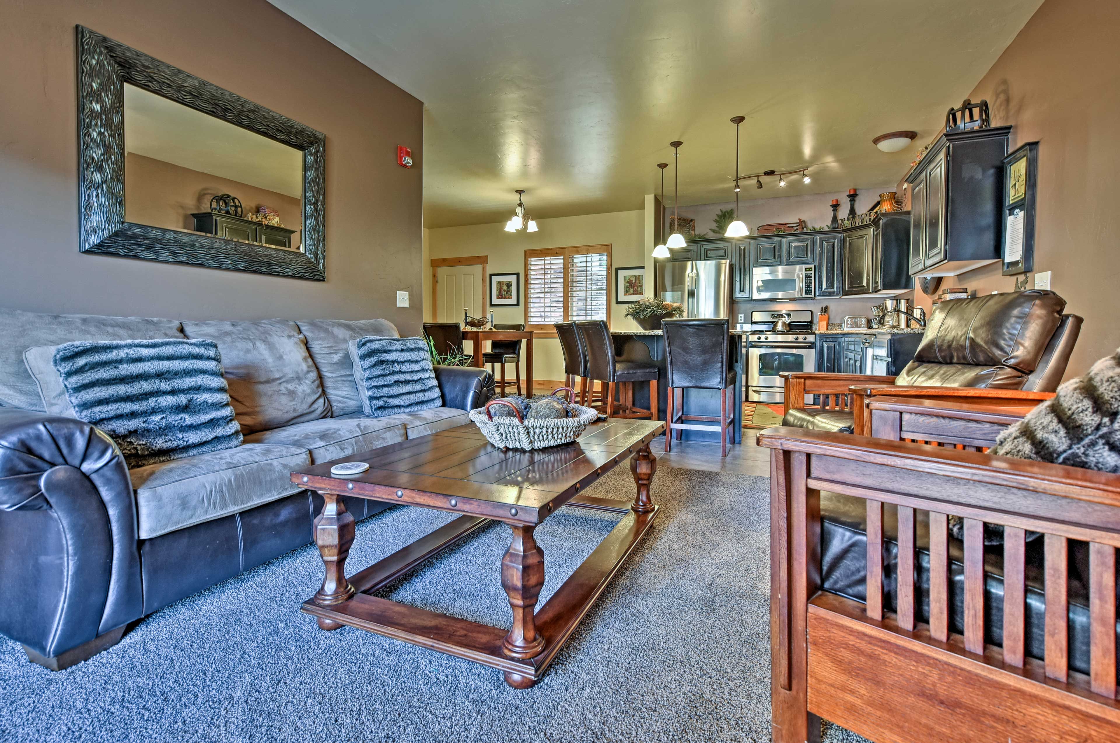 The living area featrures comfortable furnishings and a flat-screen cable TV.