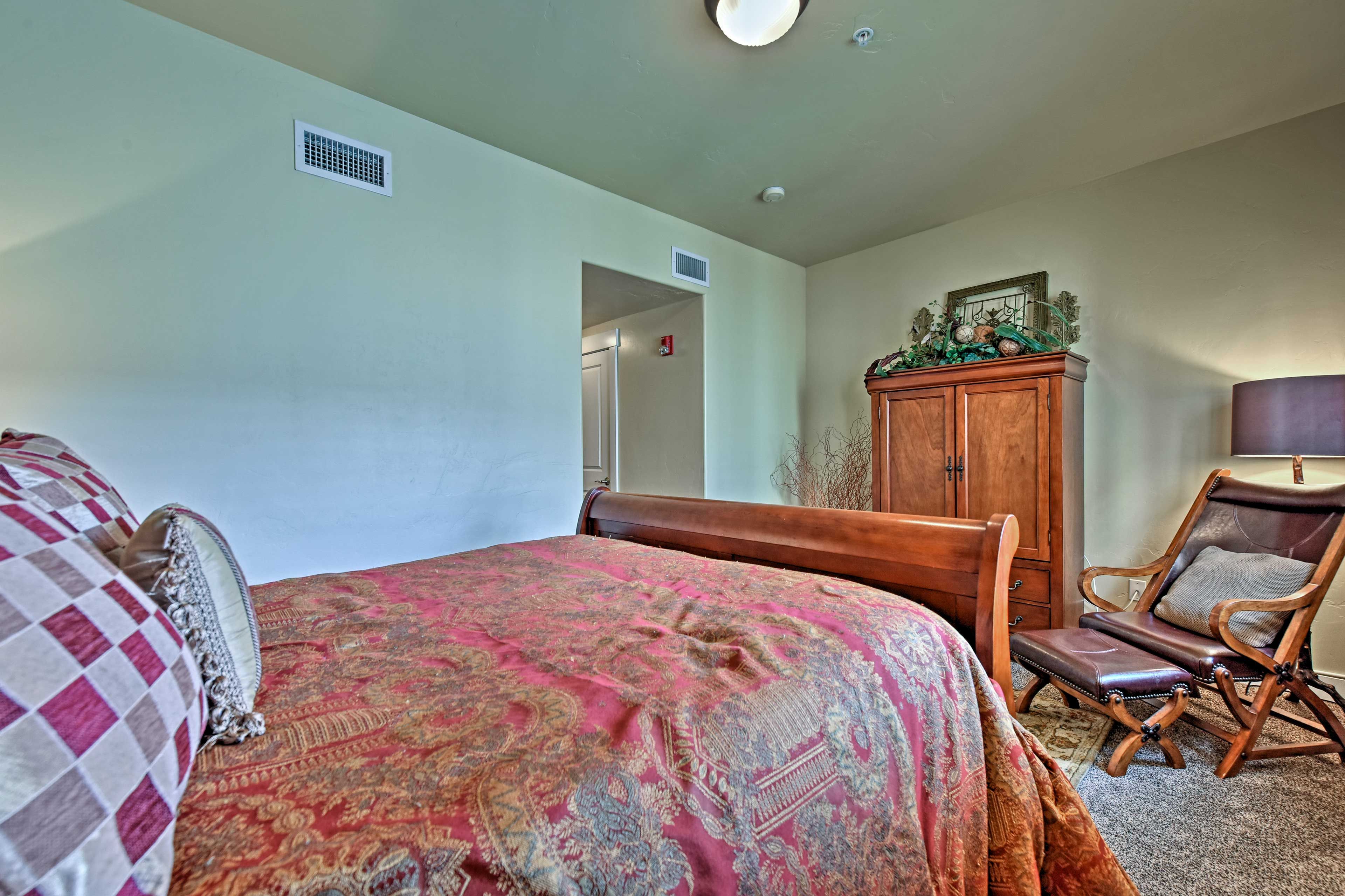 Open the armoire to reveal a flat-screen cable TV.