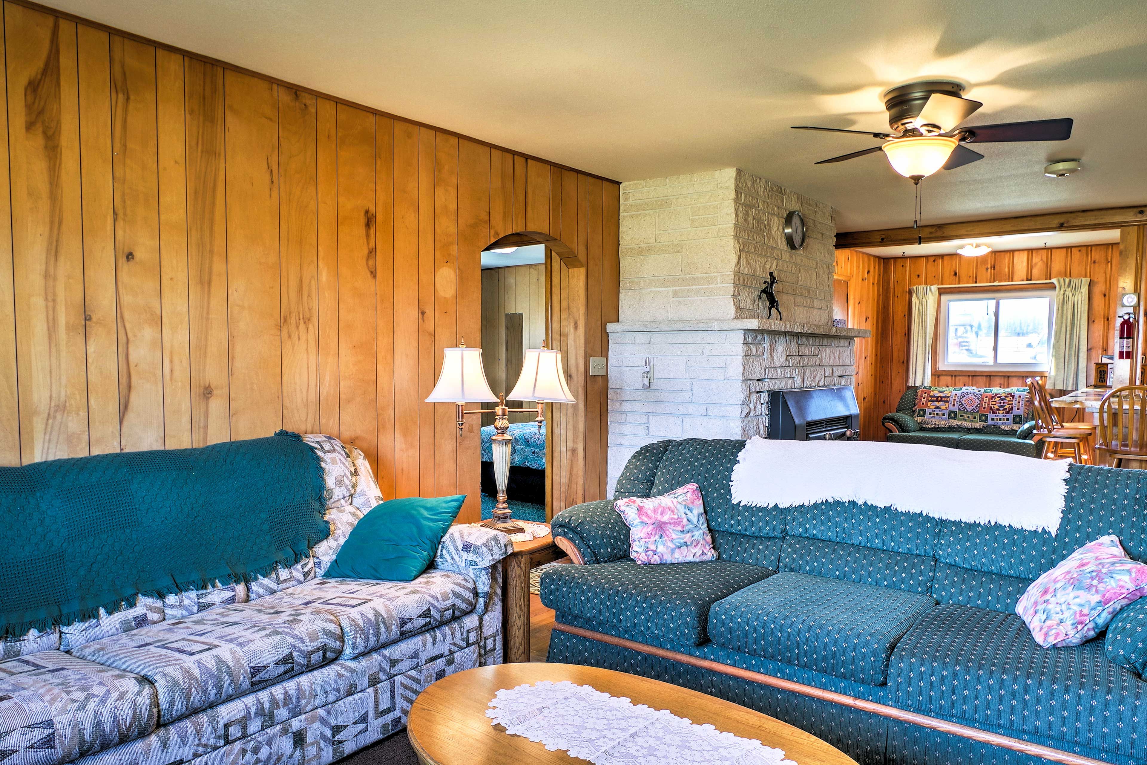One of the sofas in the living room doubles as a pullout bed for additional sleeping arrangements.