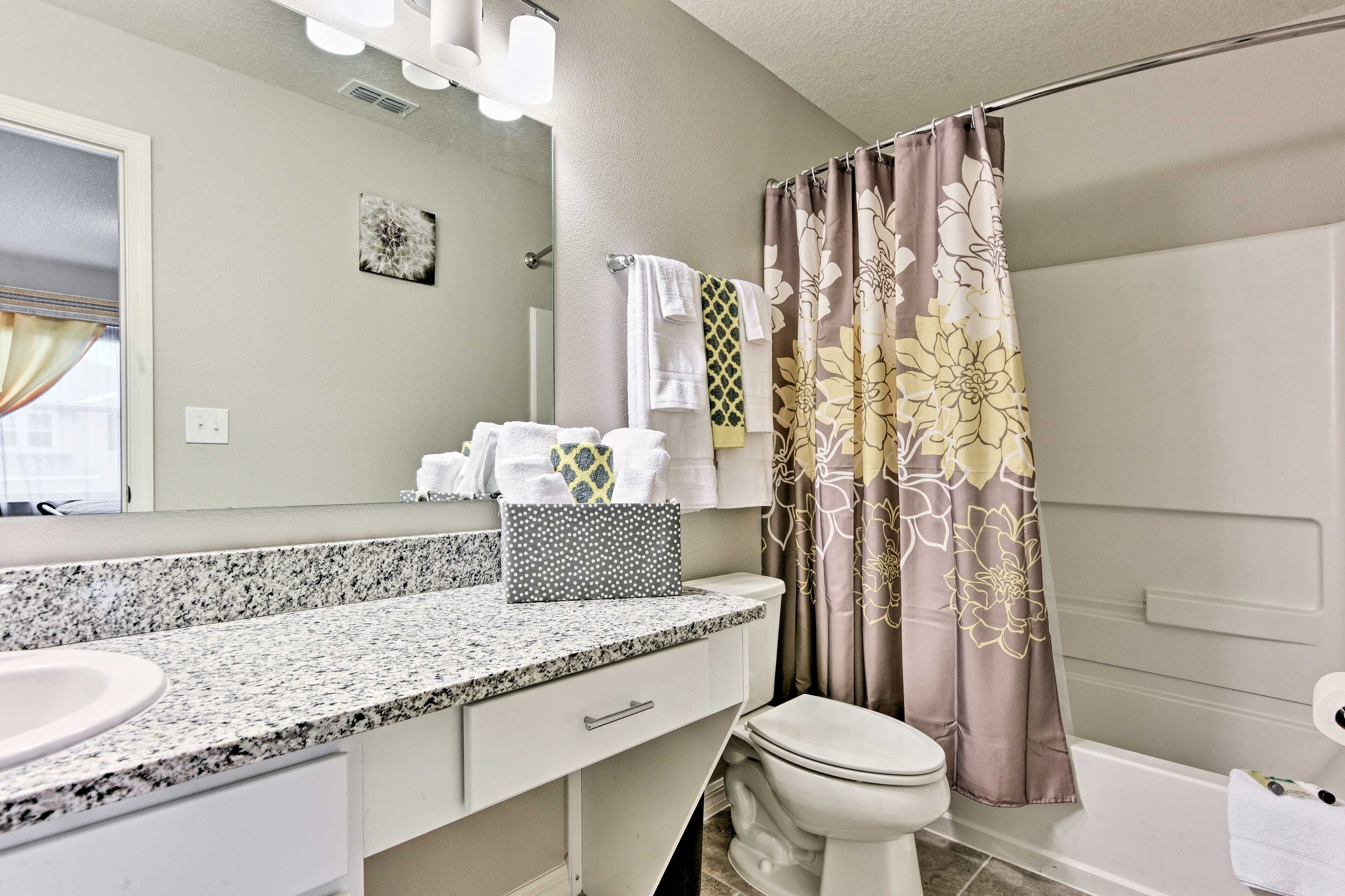 This home is equipped with 3 full bathrooms and one half-bath.