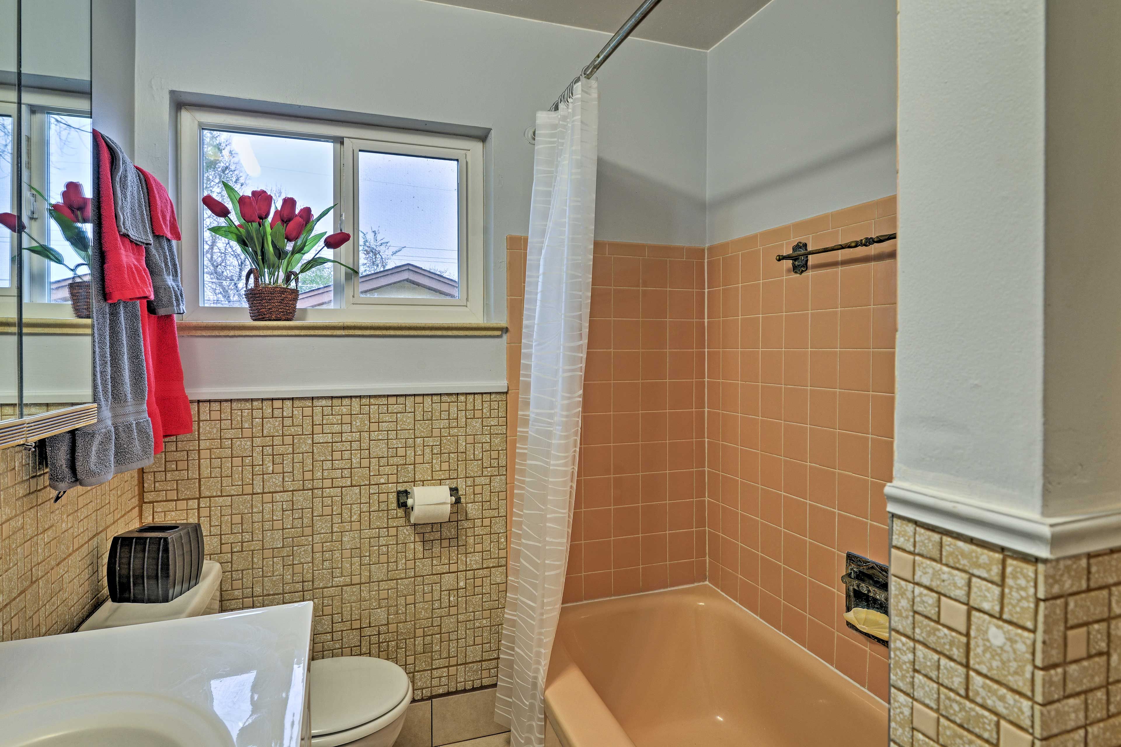 Those sharing this bathroom will have the option of taking a bath or a shower.