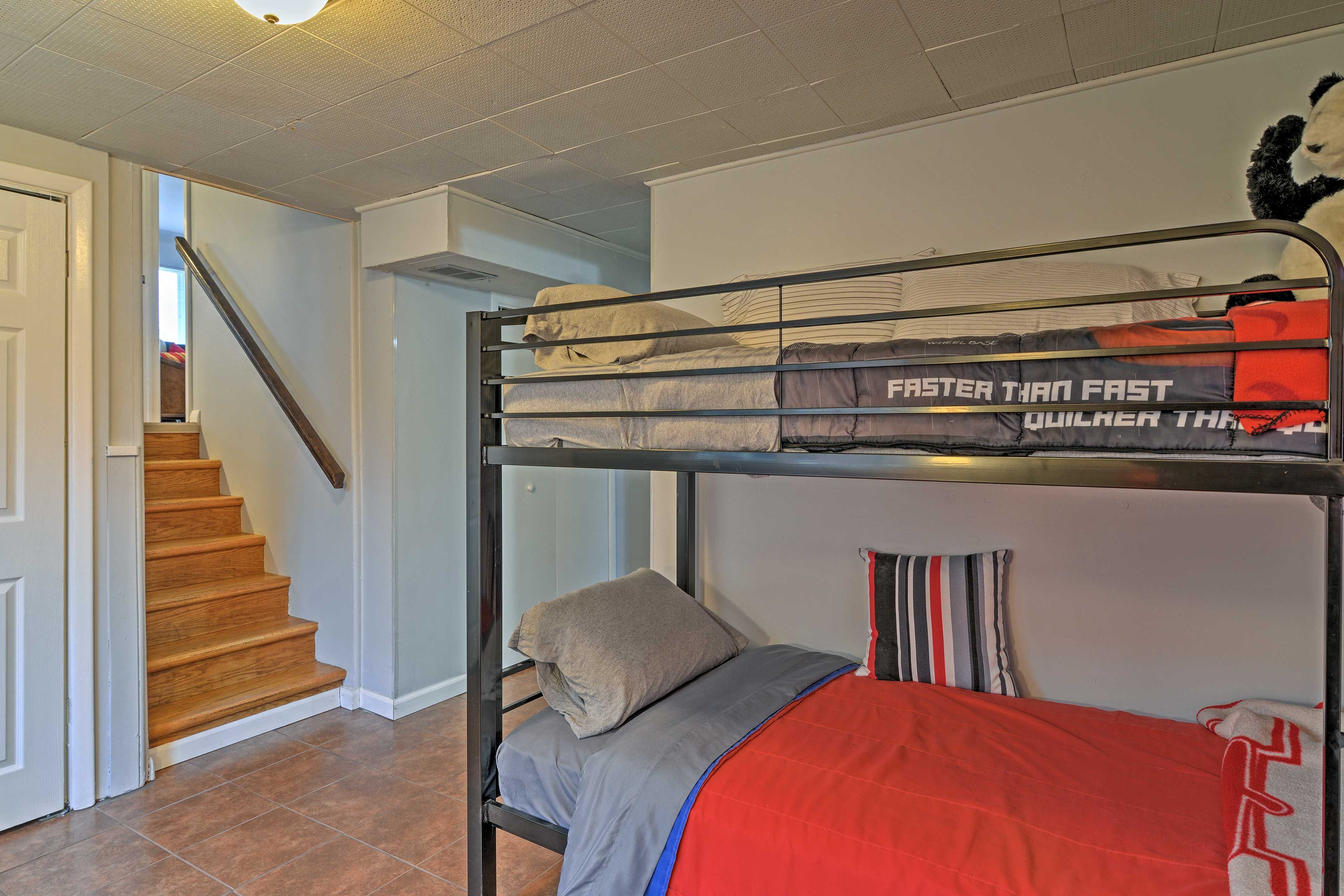 Downstairs in this tri-level house, you'll find a den area with sleeping options