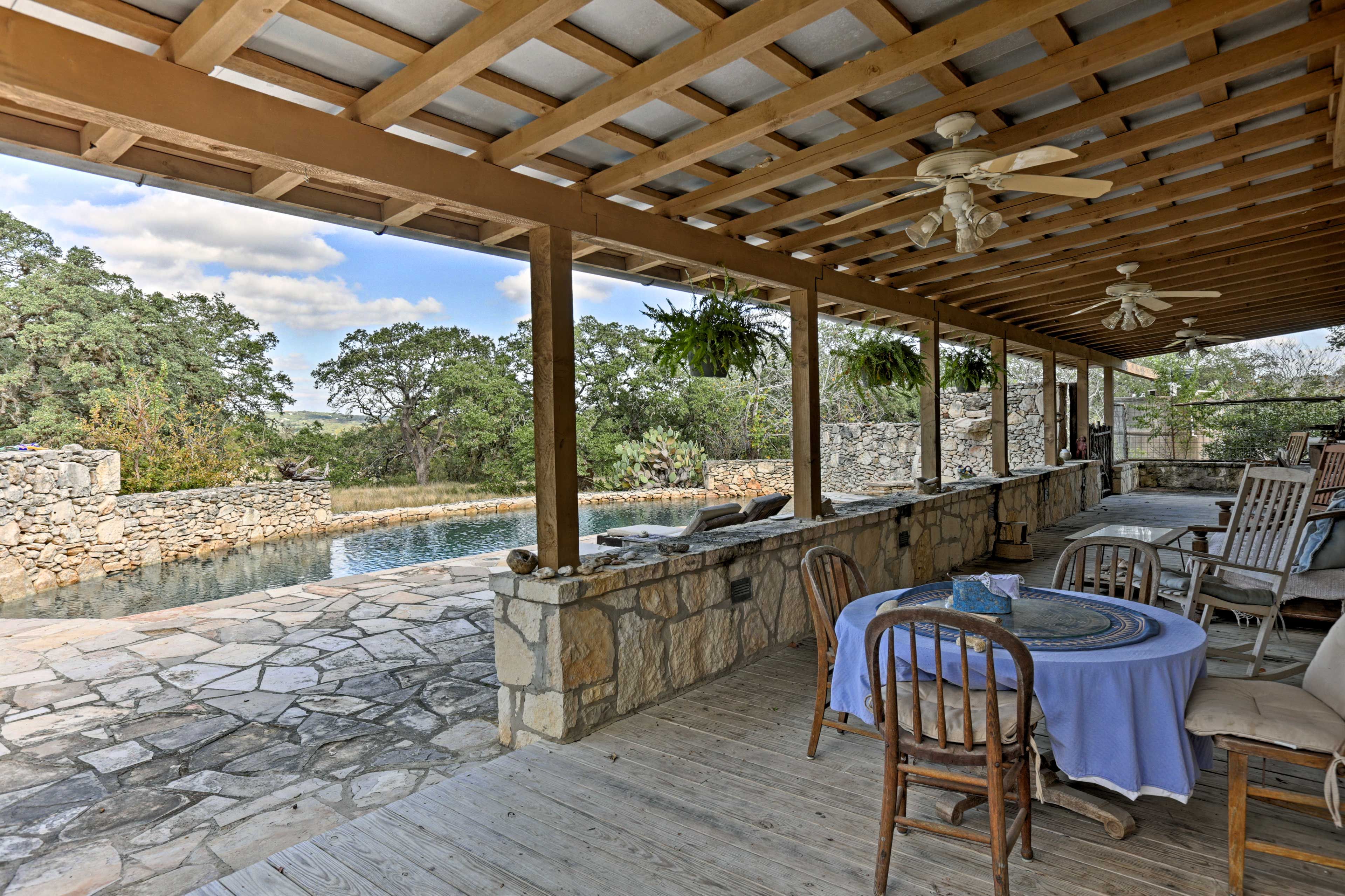 Relax under the covered patio for relaxing nights at home.
