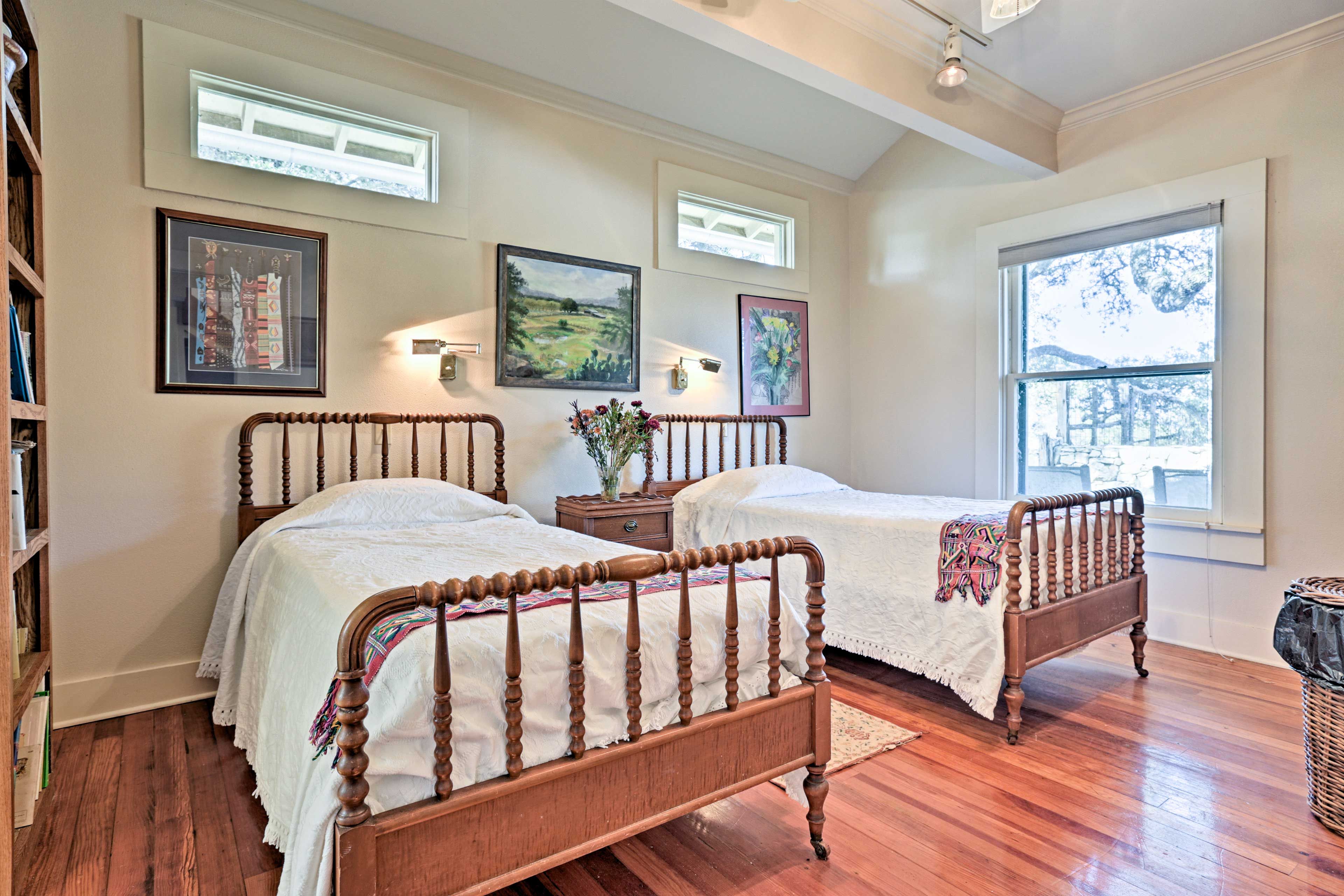 Enjoy peaceful slumbers on 2 twin beds in the downstairs bedroom.