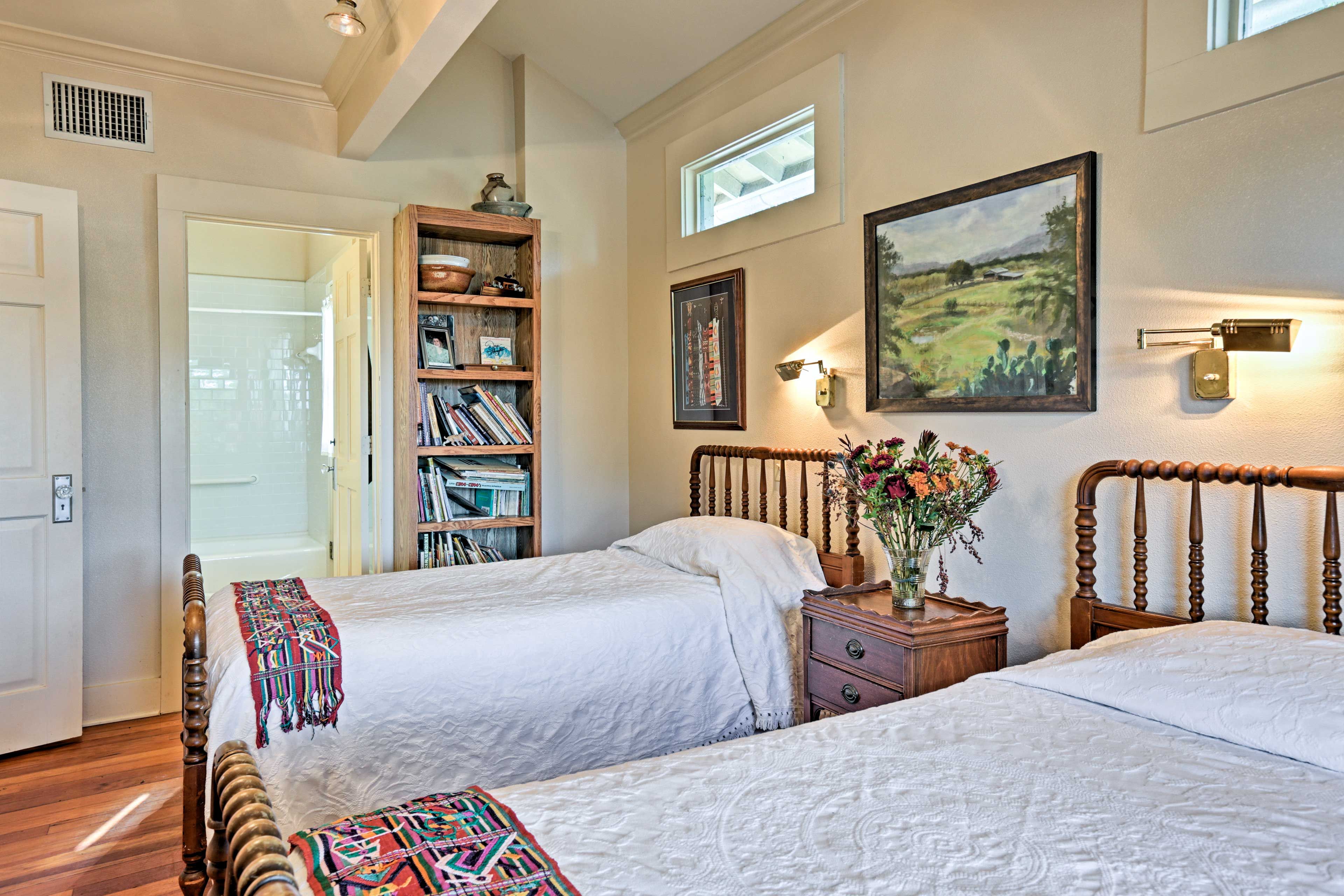 The downstairs bedroom includes the added luxury of an en-suite bathroom.