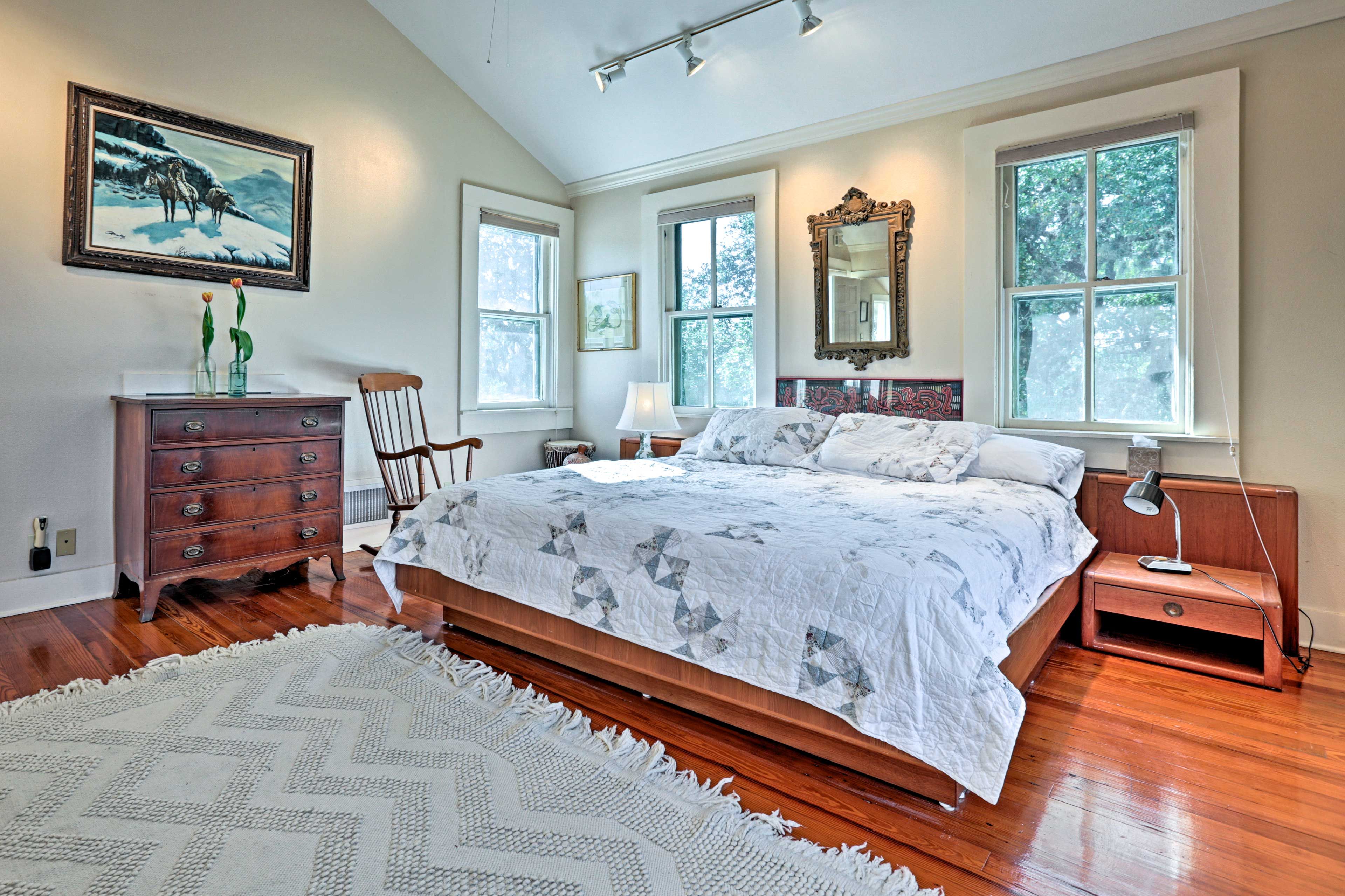 This bedroom features a plush king bed.
