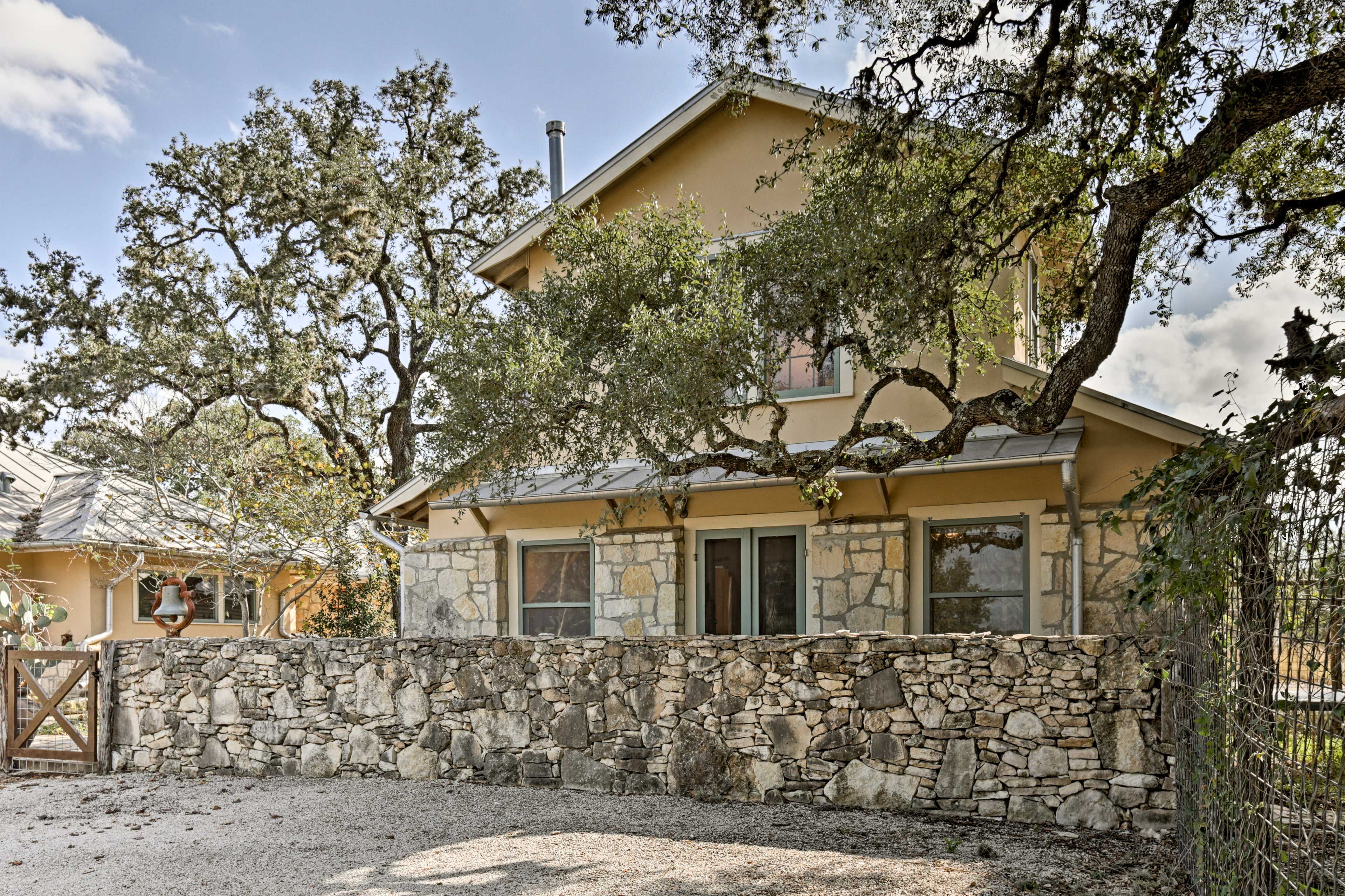 Experience outdoor views paired with remodeled amenities of this Bulverde house!