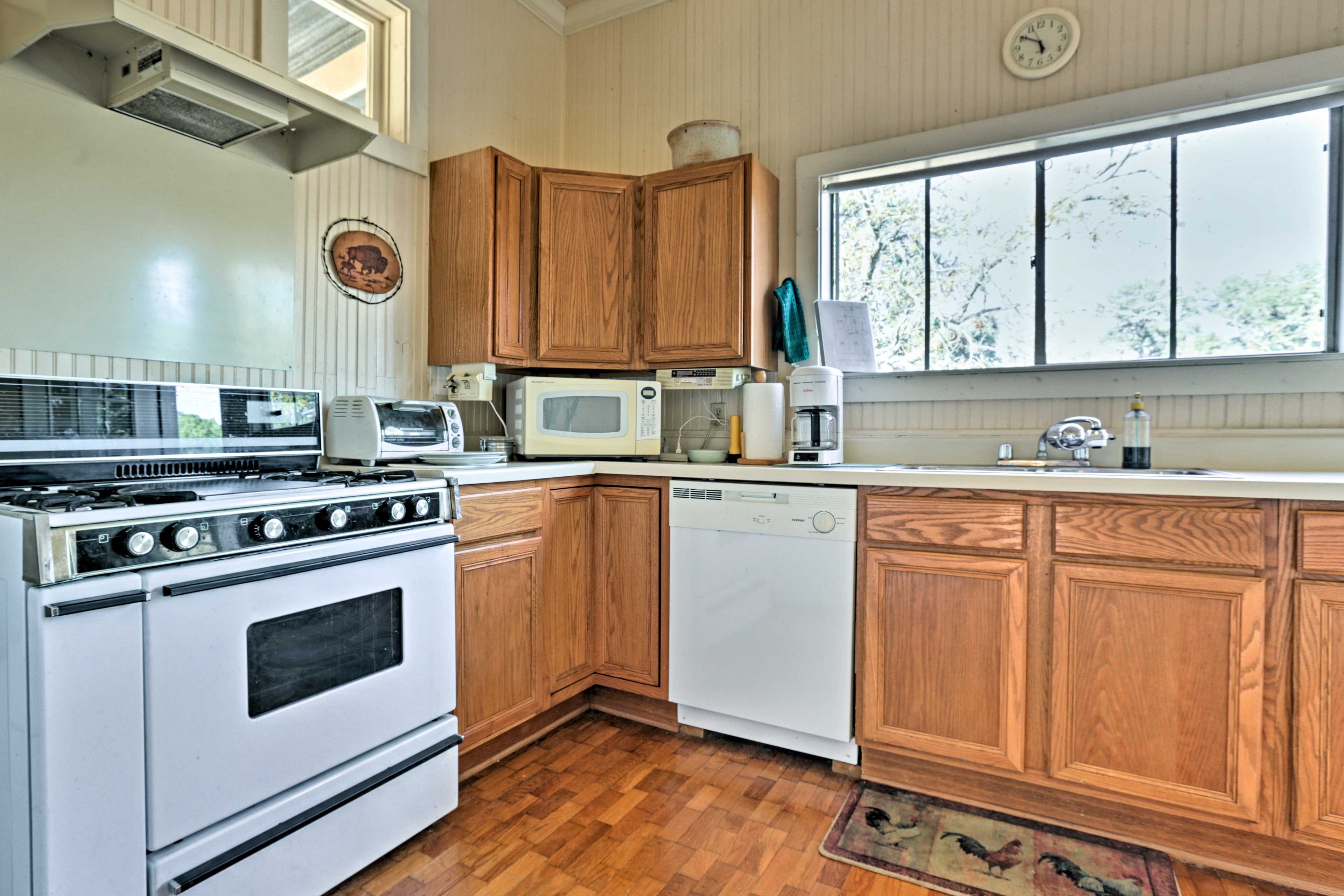 The kitchen is fully equipped with updated appliances.