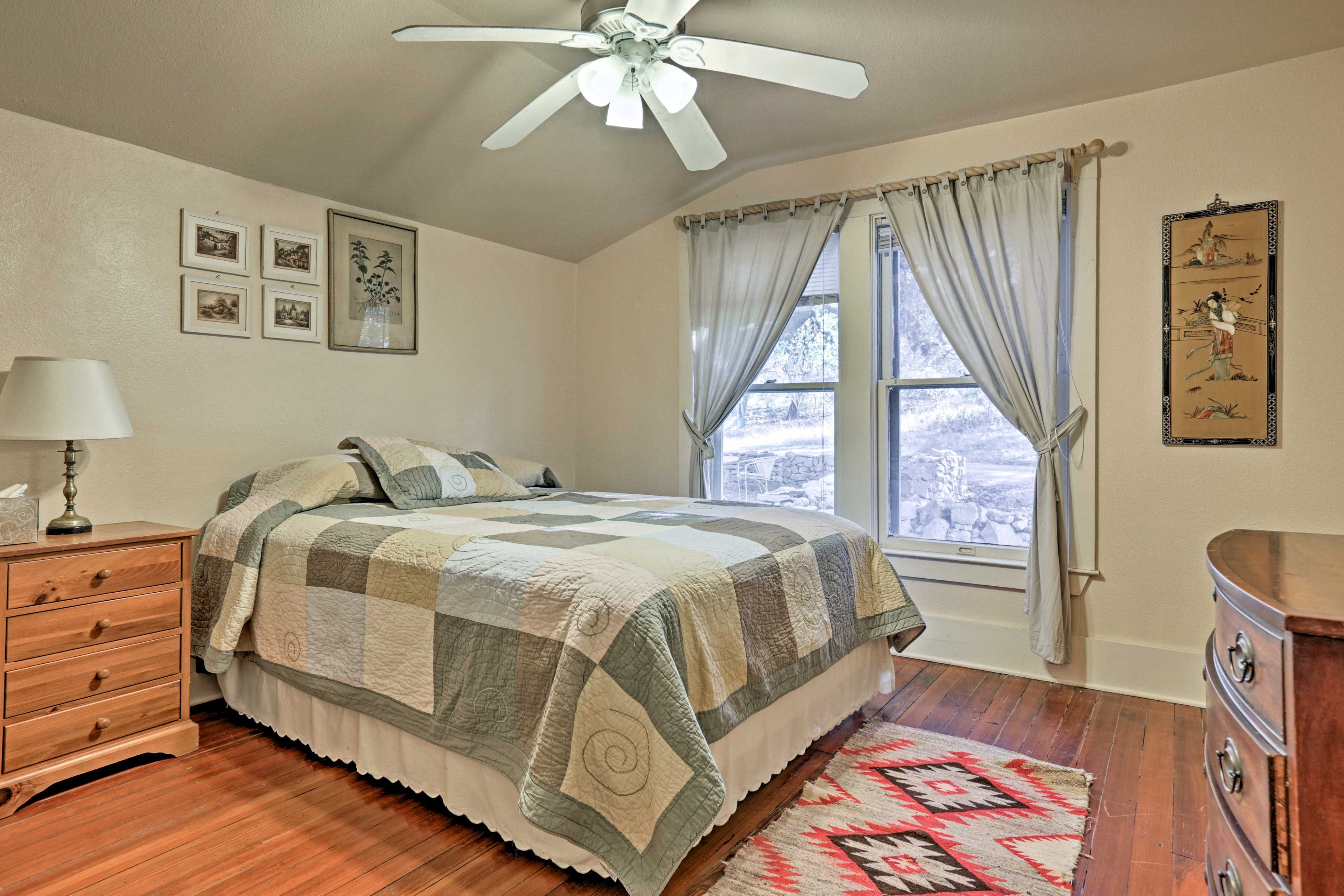The outdoors are pulled inside through the large windows.