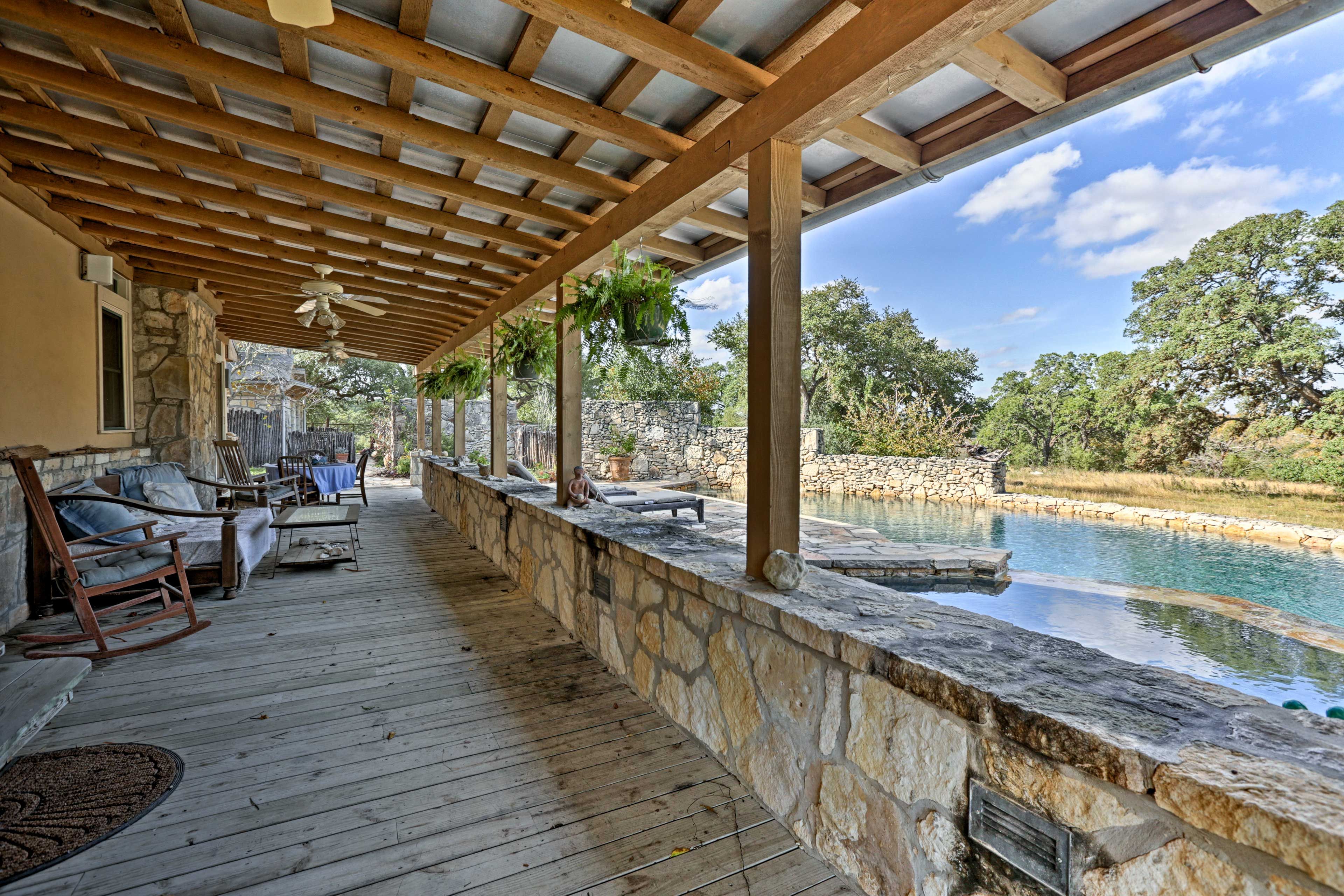 Take a spot on the wraparound deck while the kids play in the pool.