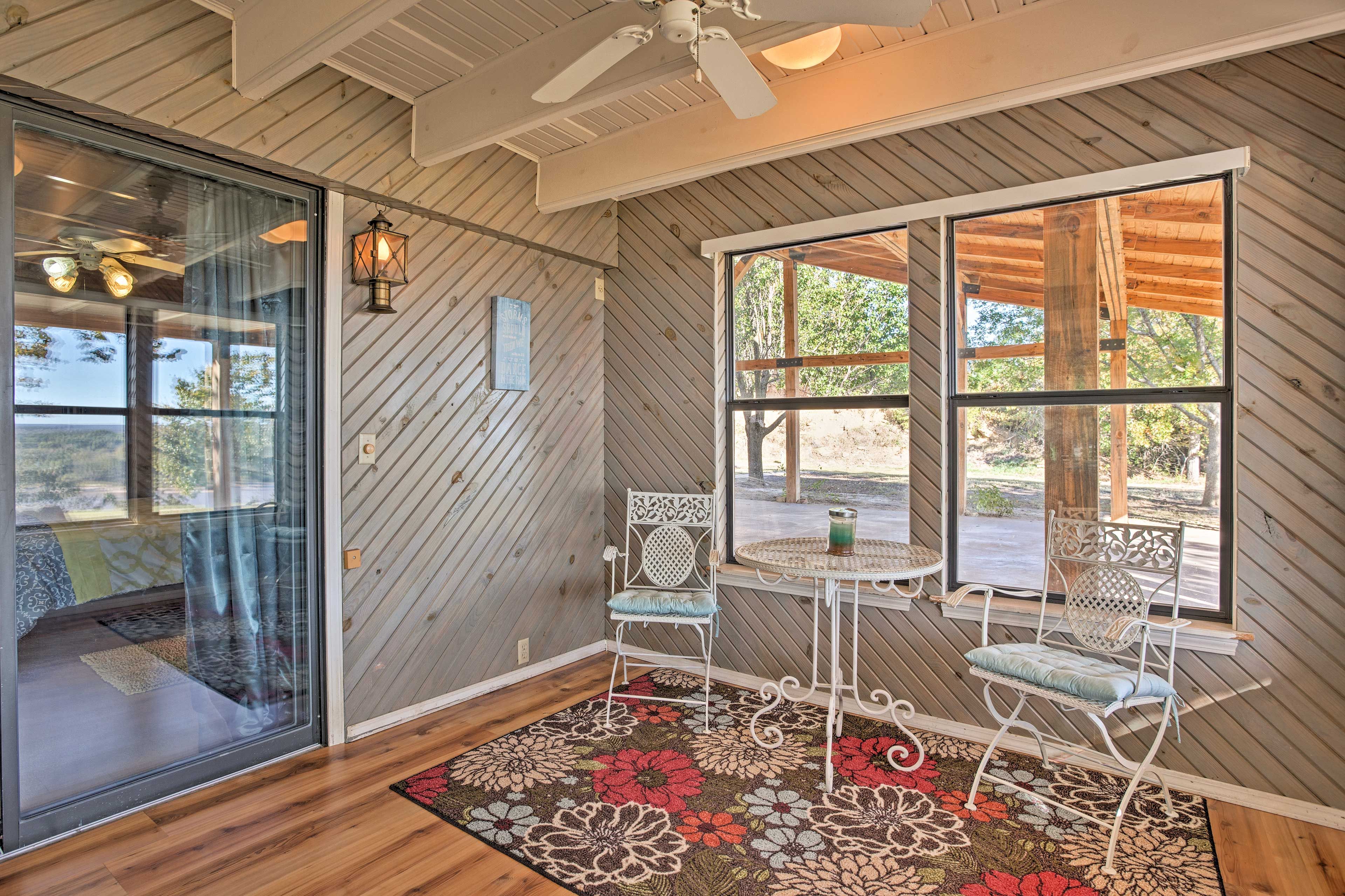 There are several places to sit in this home on Keystone Lake.